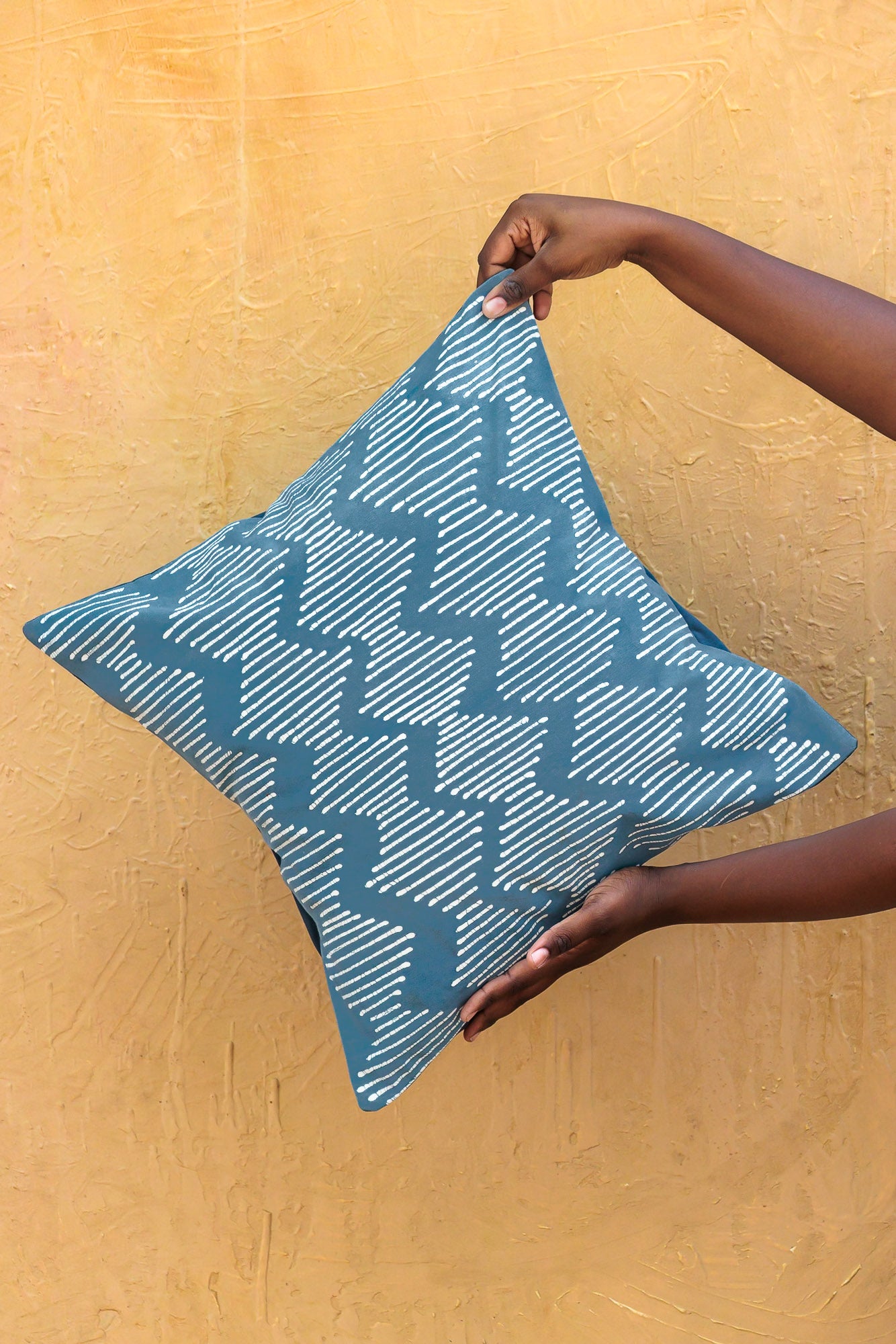 Blue wave cushion cover made in Africa from 100% cotton, is the perfect sustainable gift.