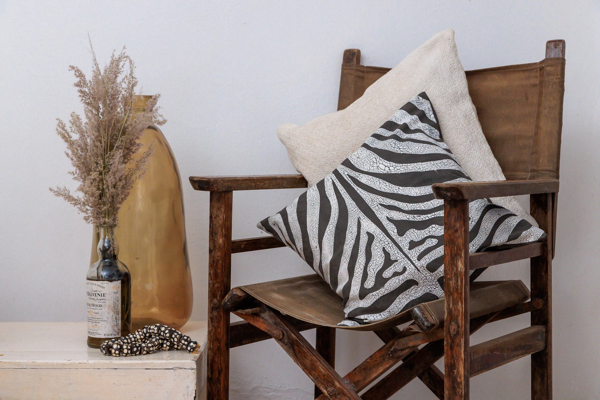 Zebra accent pillow cover, handmade with organic materials for a touch of natural beauty.
