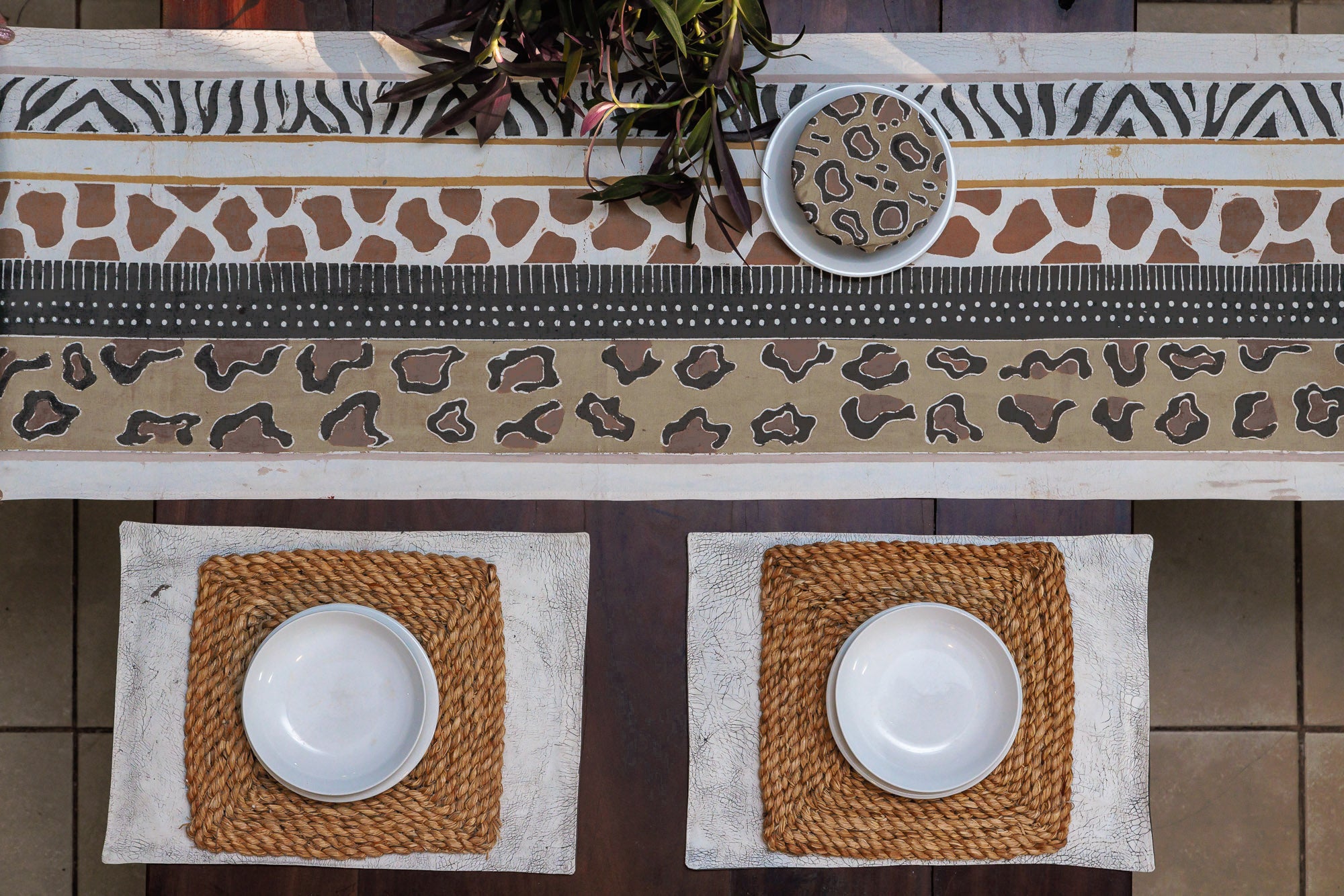Environmentally friendly table runner that mixes animal prints and beautiful fabrics.