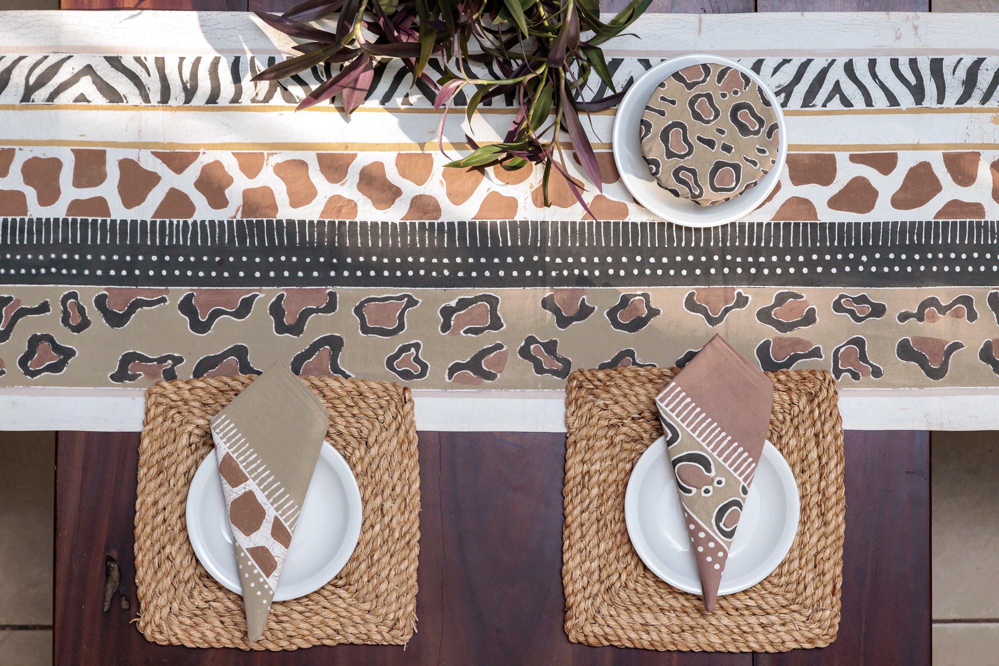 Sustainably sourced and made table runner with beautiful patterns of African safari animals.