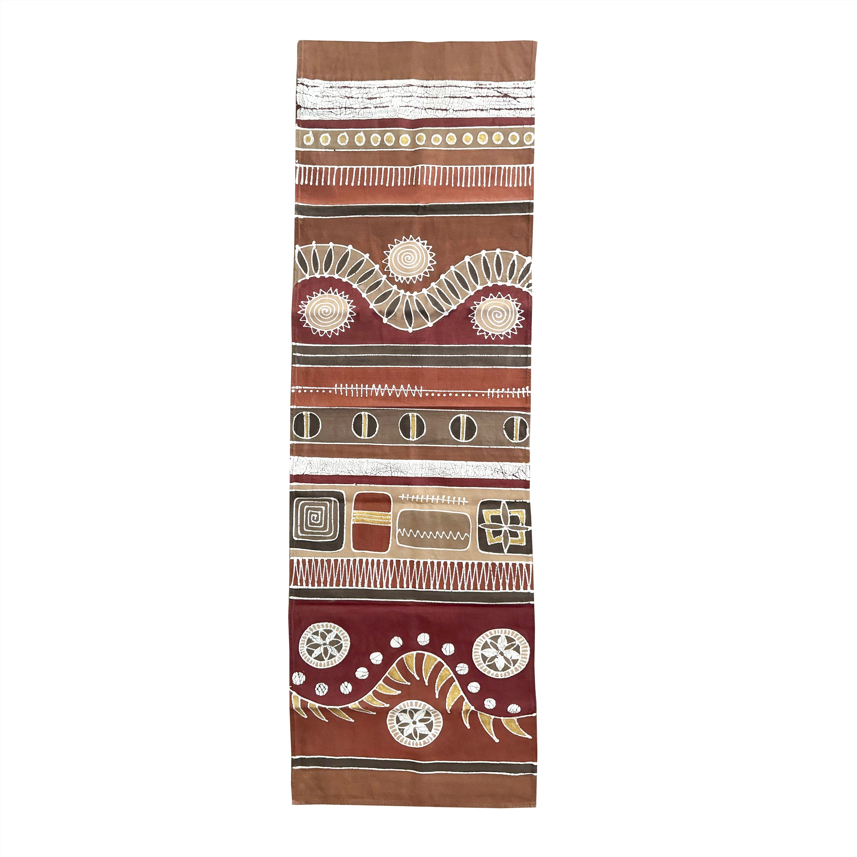 A warm red and brown colour wall hanging in african patterns