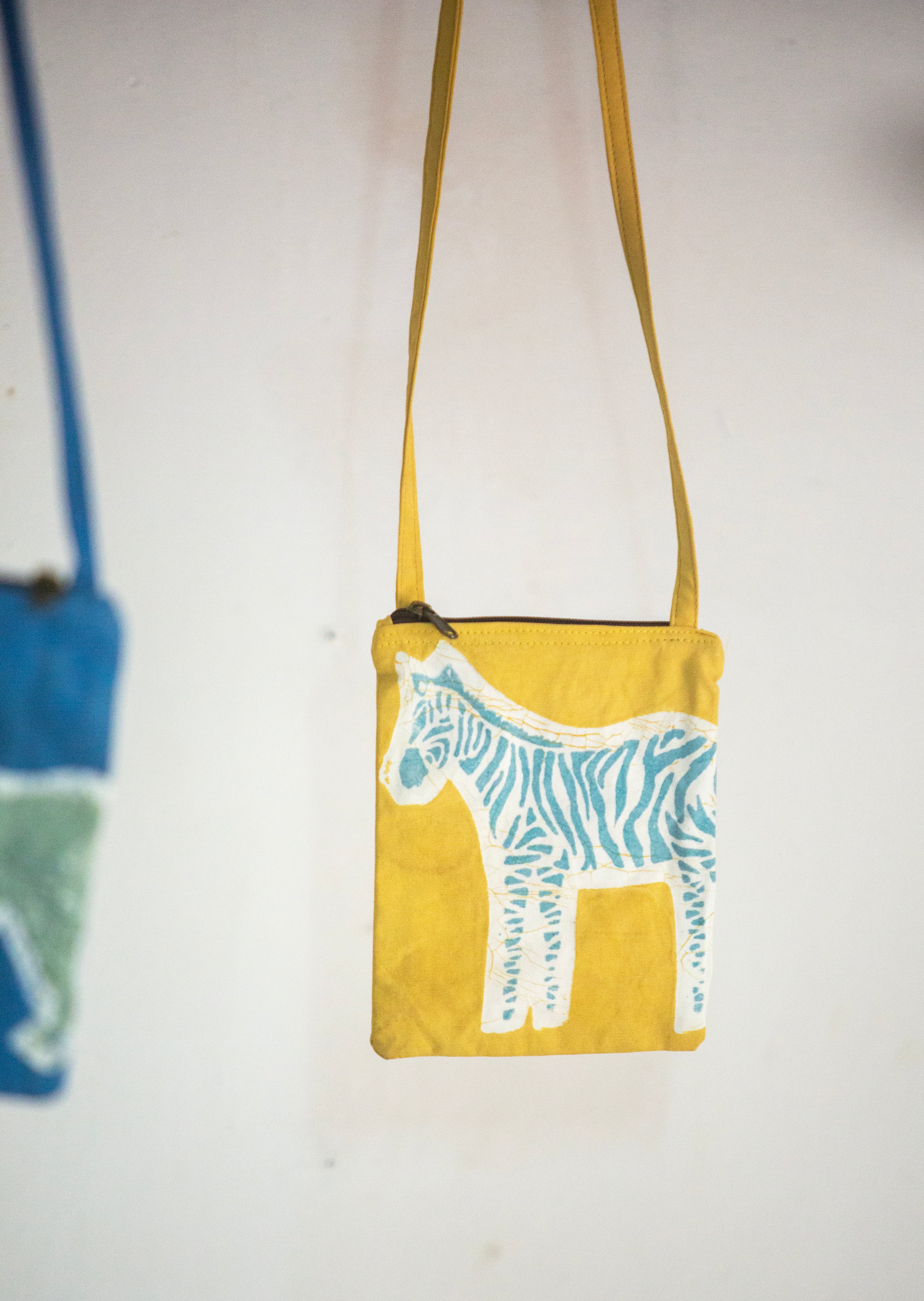 Beautiful yellow zebra passport bag.