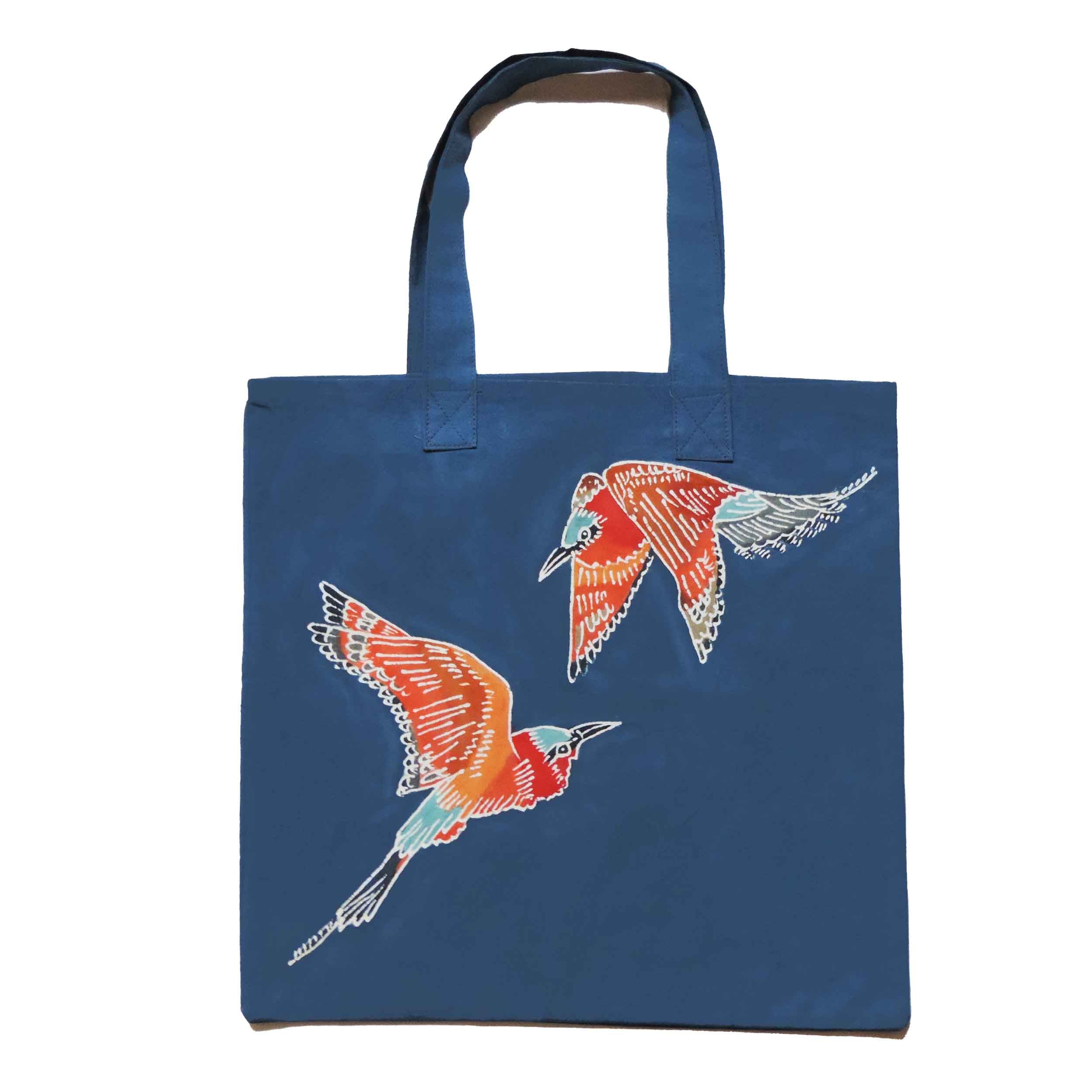 Travel in sustainable style with our beautiful blue bird tote bag.