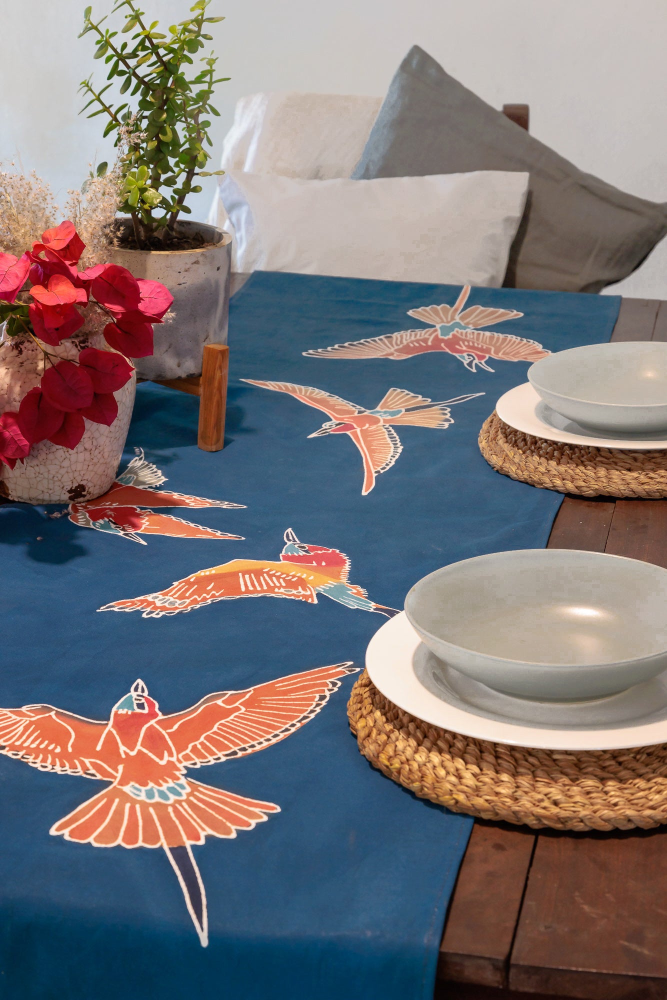 The perfect way to elevate your dining table with our deep blue bird table runner, destined to dazzle your dinner guests.