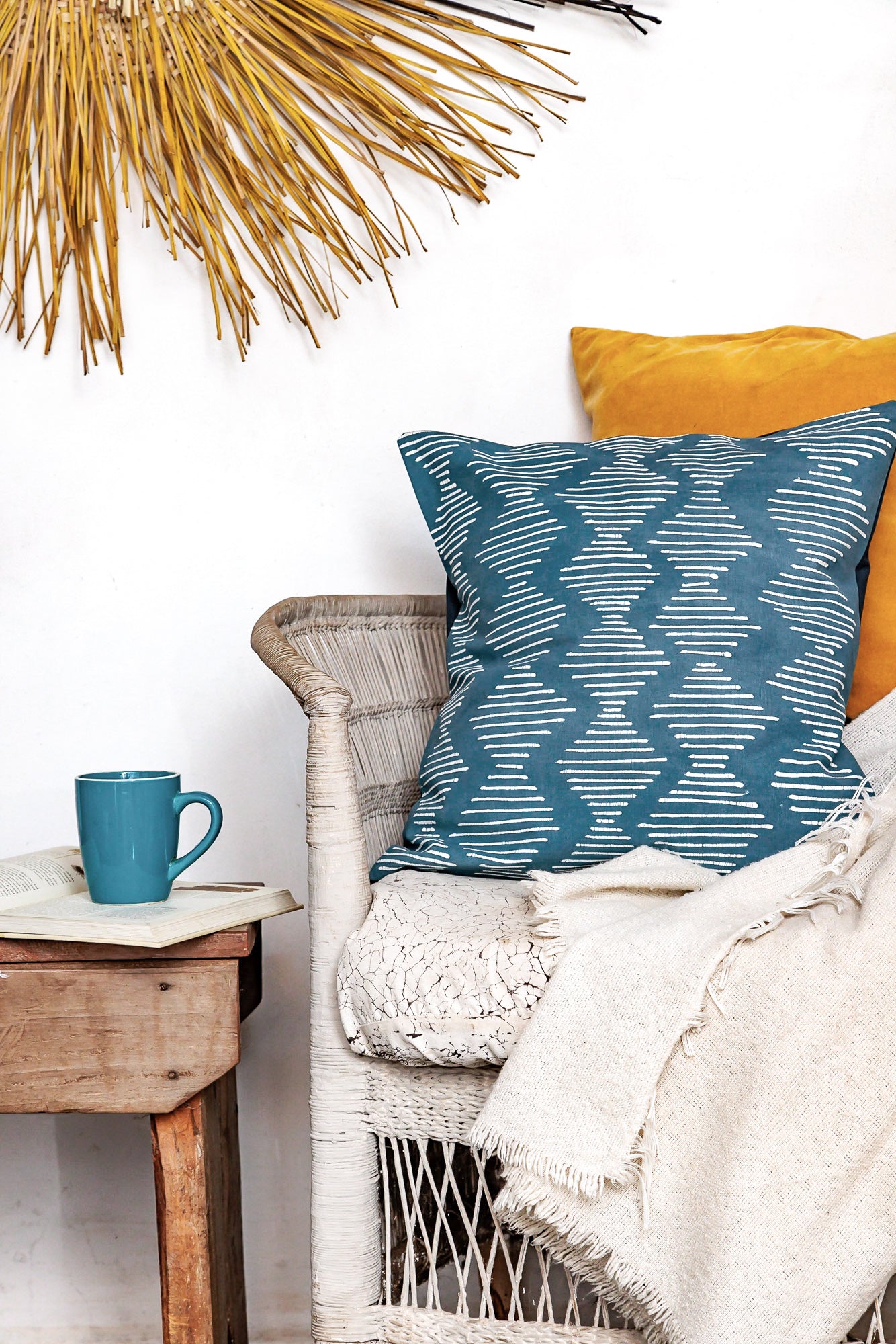 Beautiful blue cushion cover adorned with wave patterns to introduce fashionable fun into your living room.