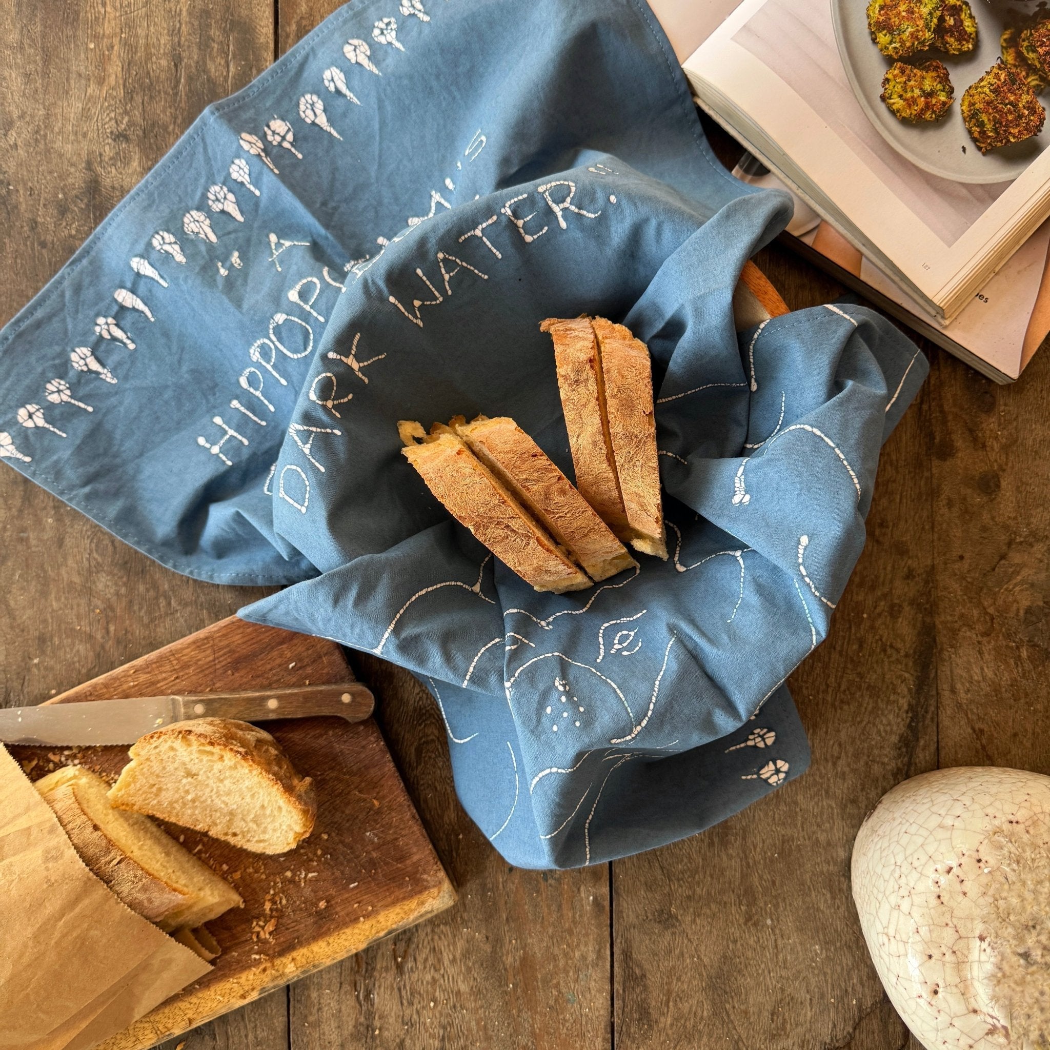 Sustainable eco friendly kitchen accessory tea towel with hippo design