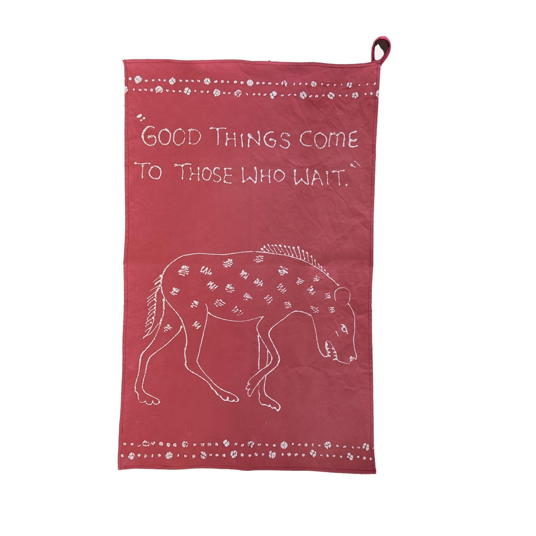 Ethical kitchen tea towl with hyena in red.