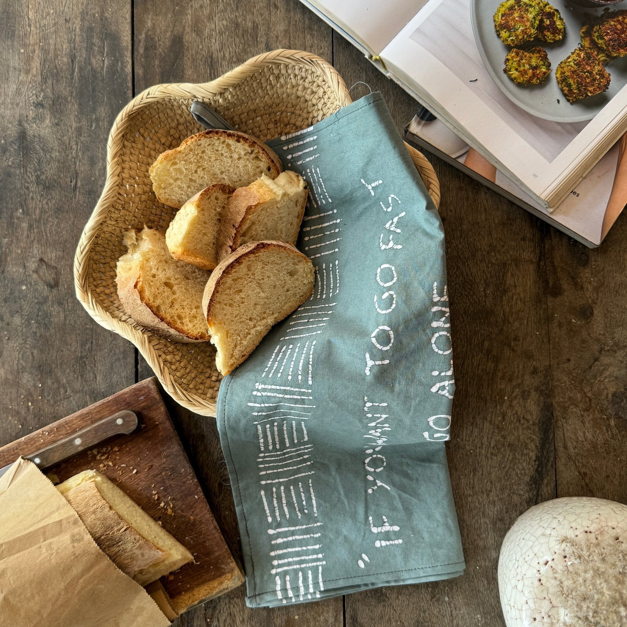 light teal kitchen tea towel sustainably made with wild dog design.