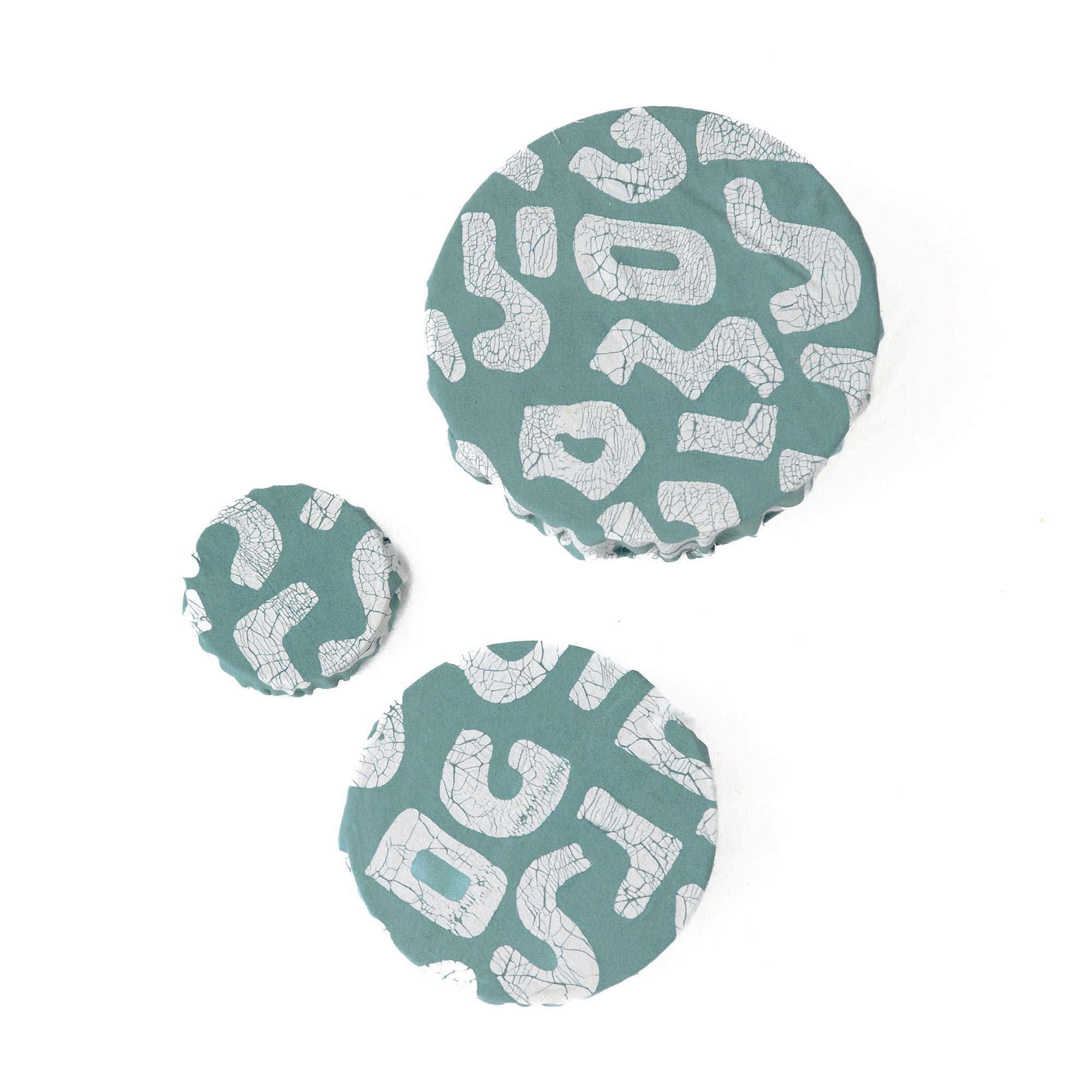 Keep your food fresh and fashionable with our beaitful light blue bowl covers with a squiggle pattern.