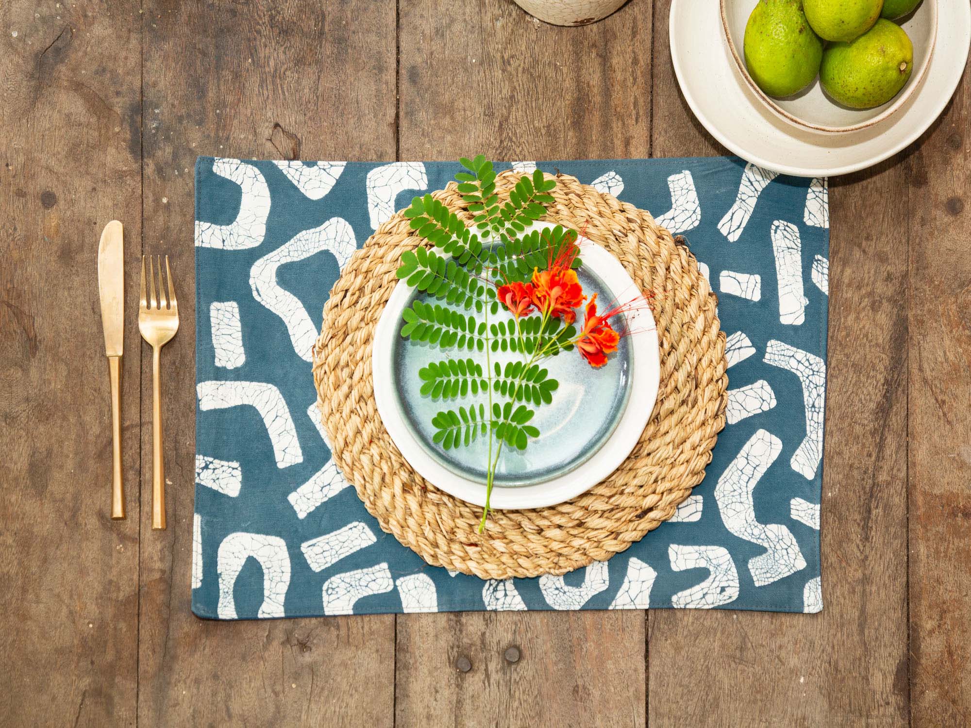 African made teal table mats, created with sustainable flare and in a certified ethical workshop.