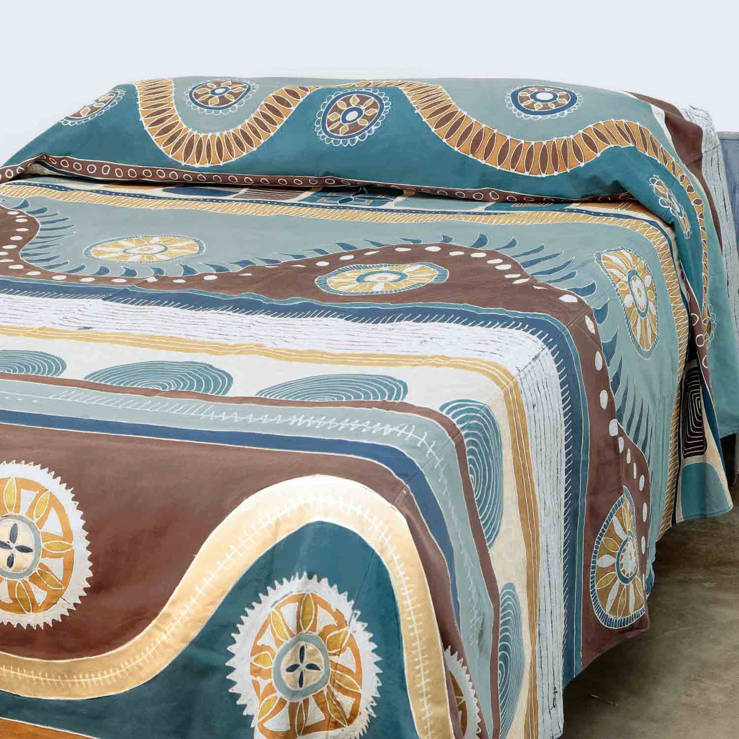 Beautiful blue bed covers, adorned in a hand-painted hill patterns and made from sustainable 100% cotton.