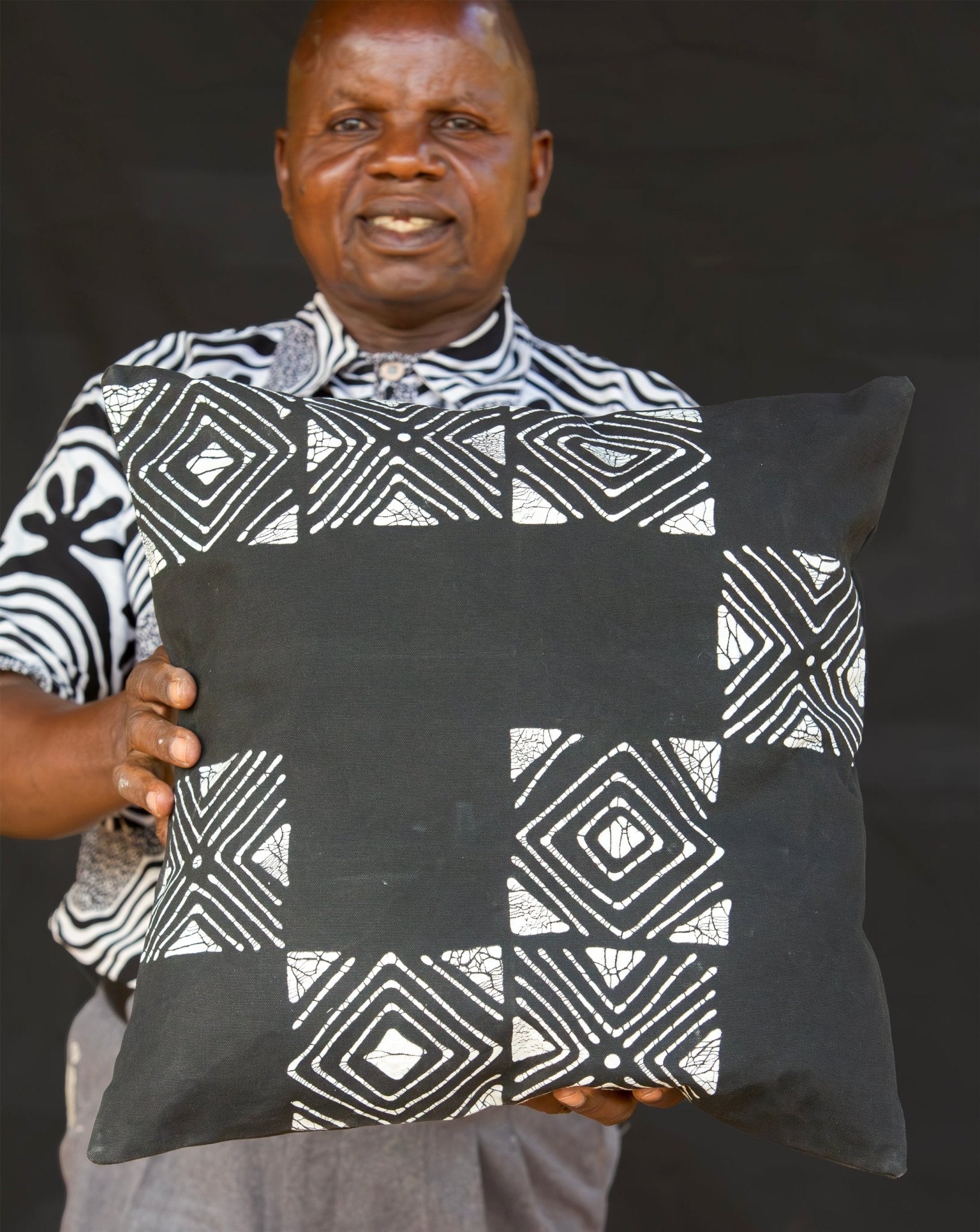 Eco-friendly pillow cover with authentic black mud cloth pattern.