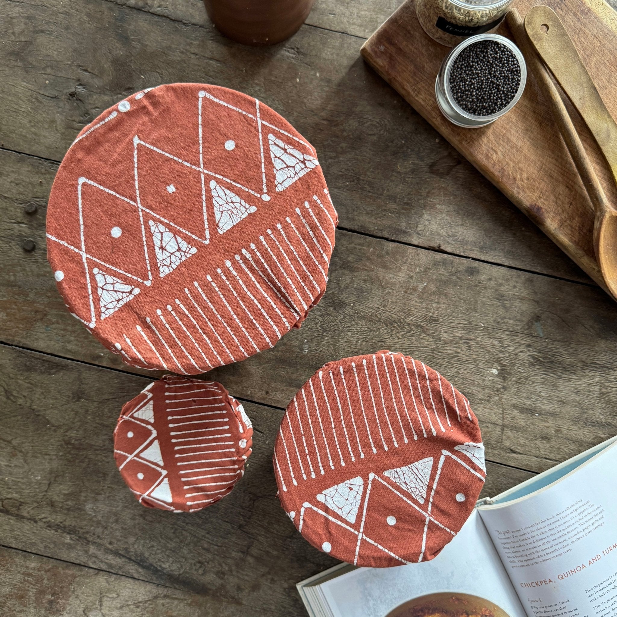 reusable food bowl covers made in 100% cotton in a rusty red mud cloth pattern