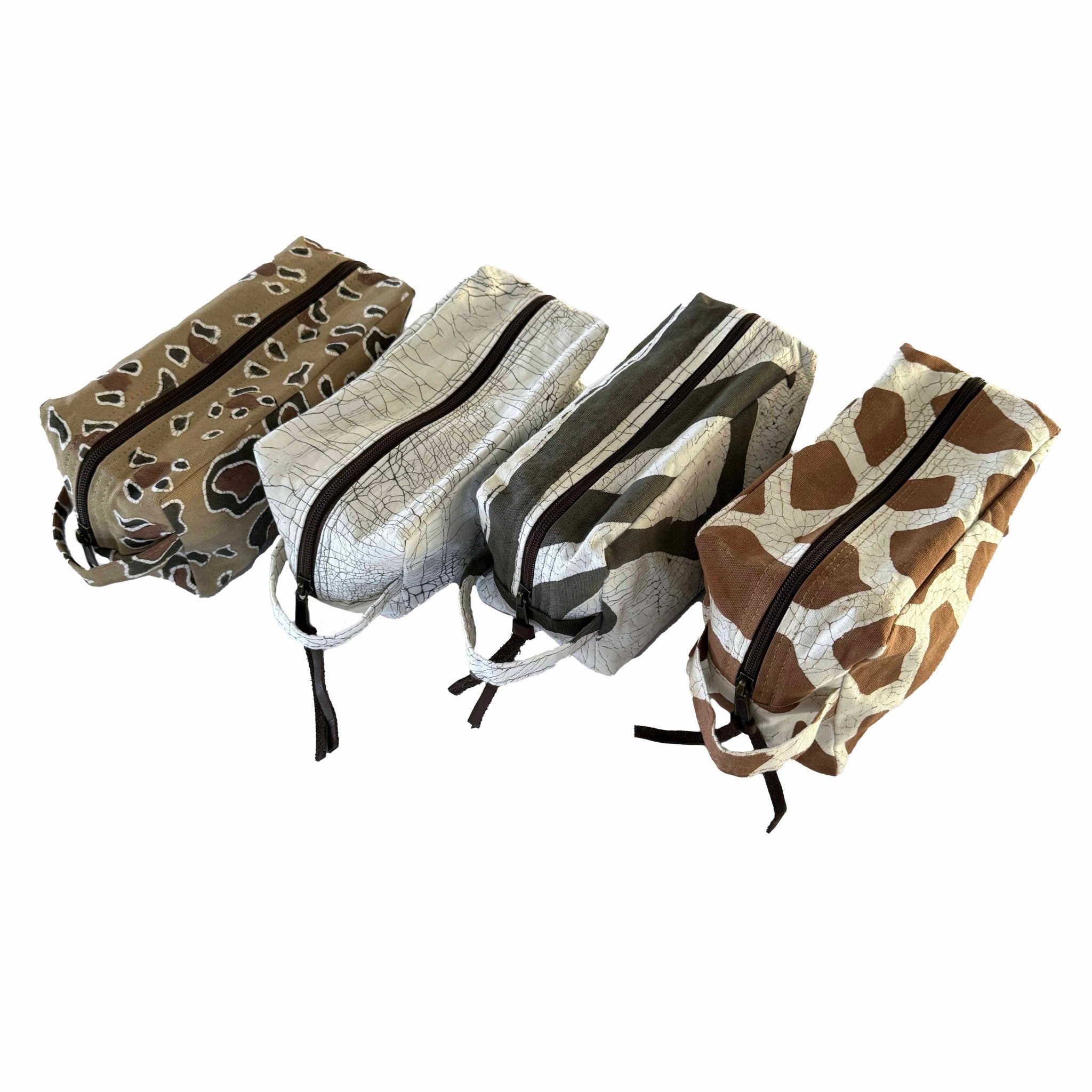 Animal print travel bags made from sustainably sourced cotton and handcrafted in Zambia.