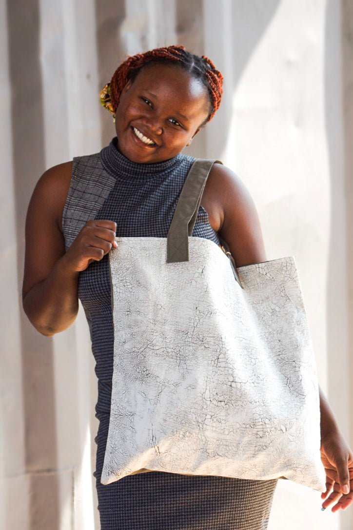 Large travel tote bag with crack batik pattern in white.