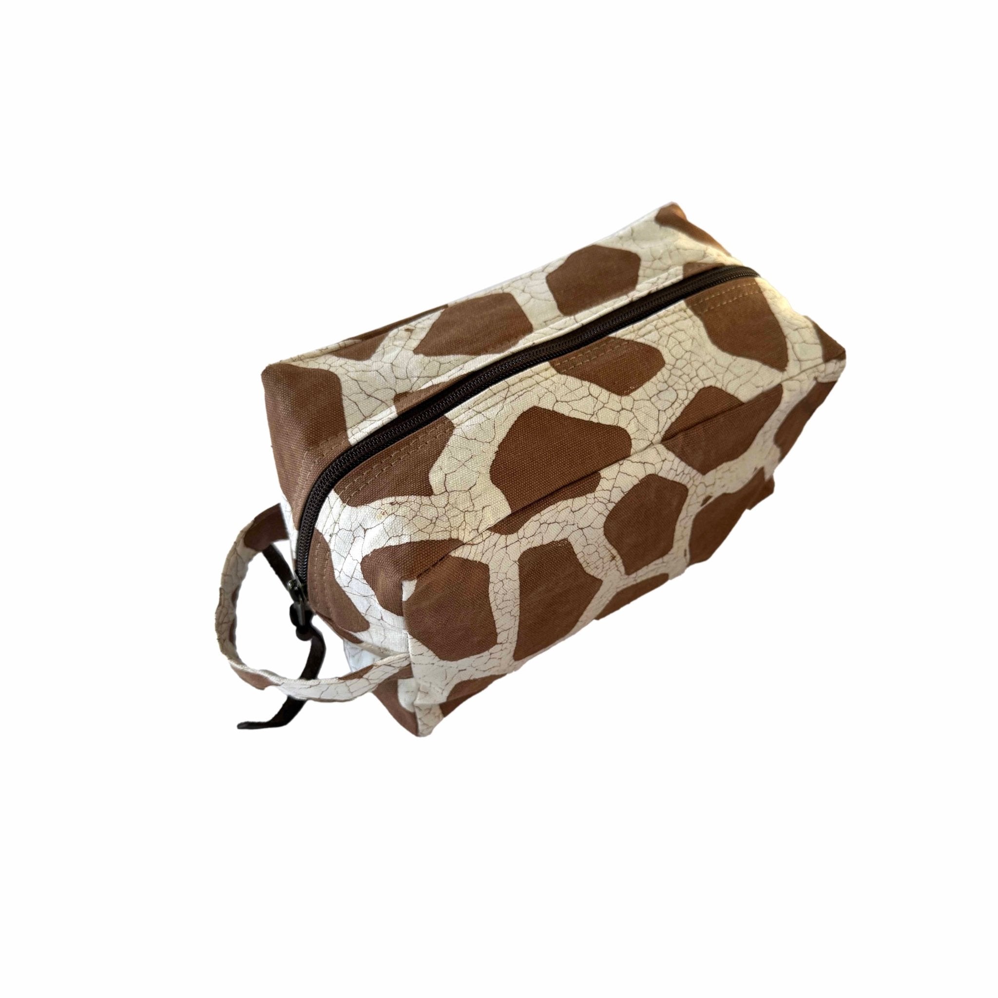 Giraffe print wash bag made from organic cotton, perfect for the eco traveller.