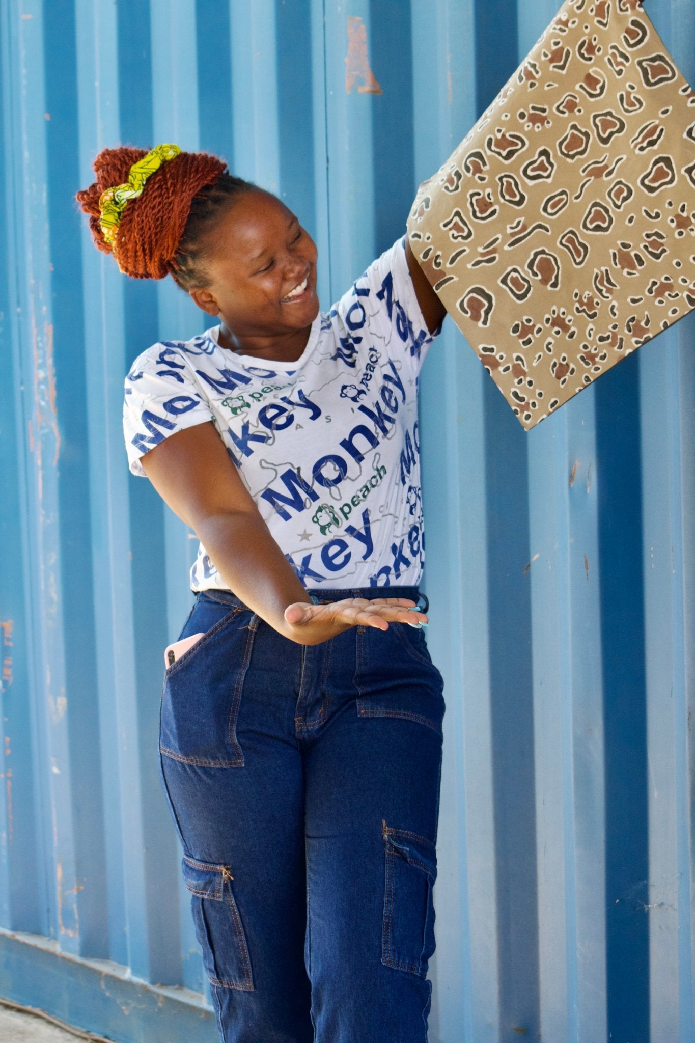 Handcrafted cushion cover with leopard batik design, capturing the allure of African wildlife.