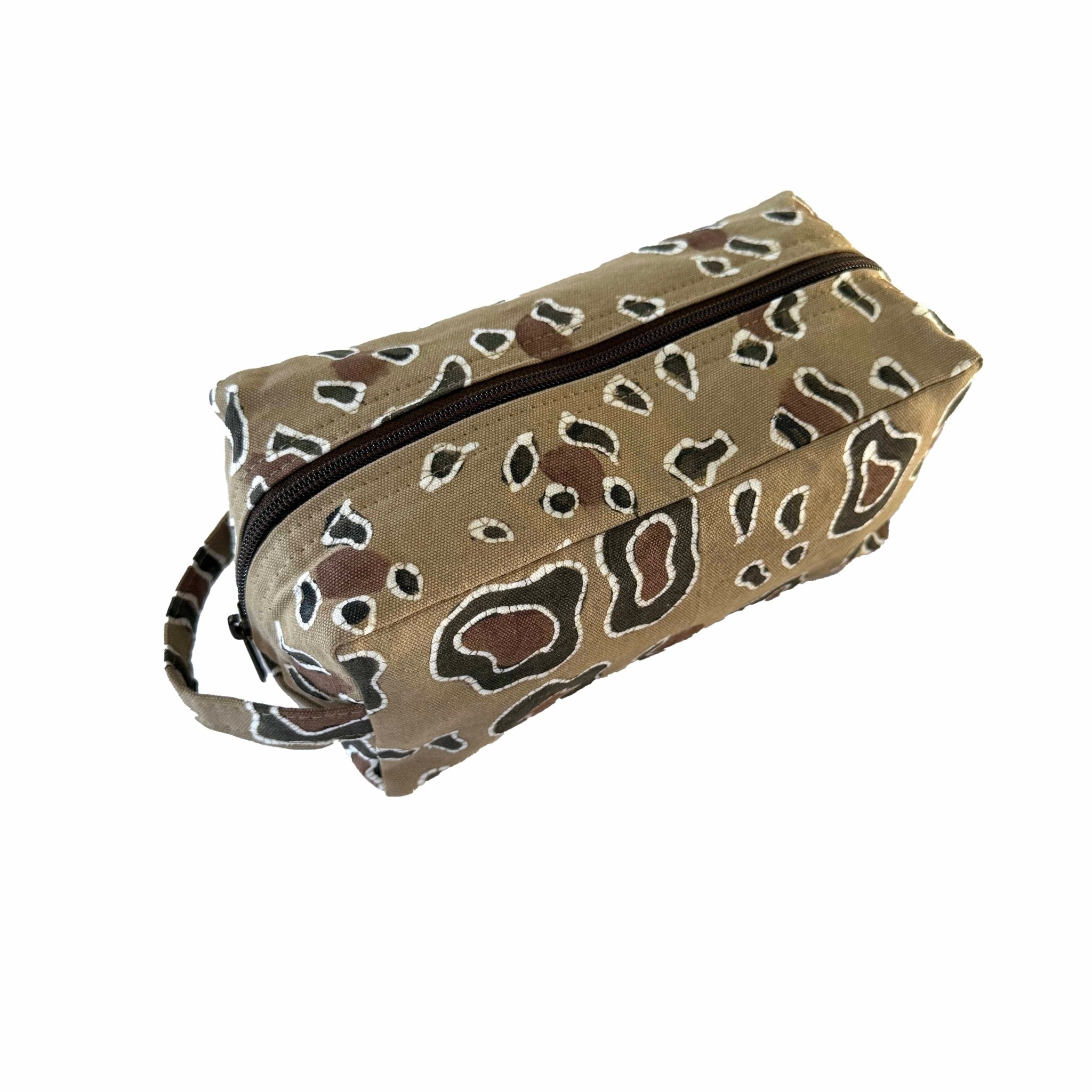 Hand painted leopard print animal wash bag design.