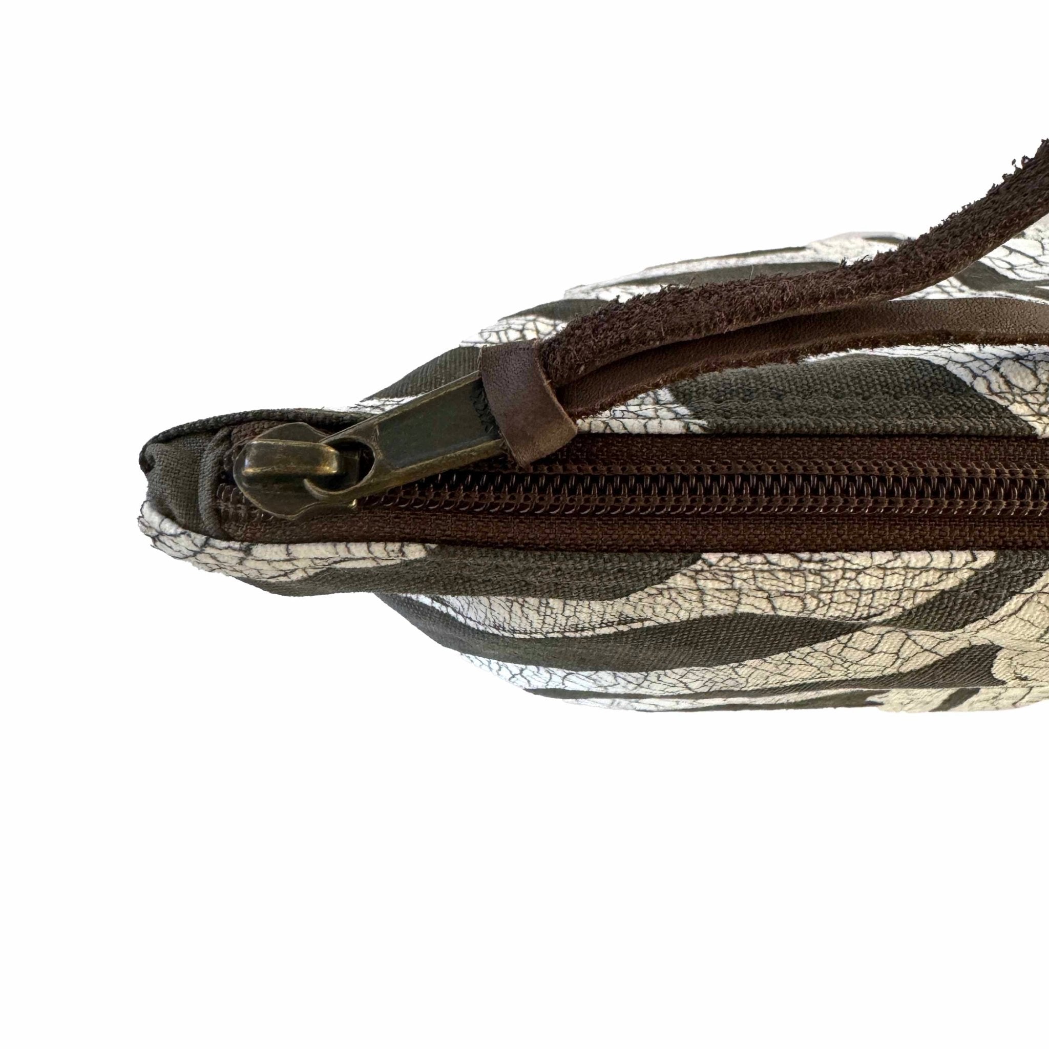 Zip up zebra print travel wash bag.