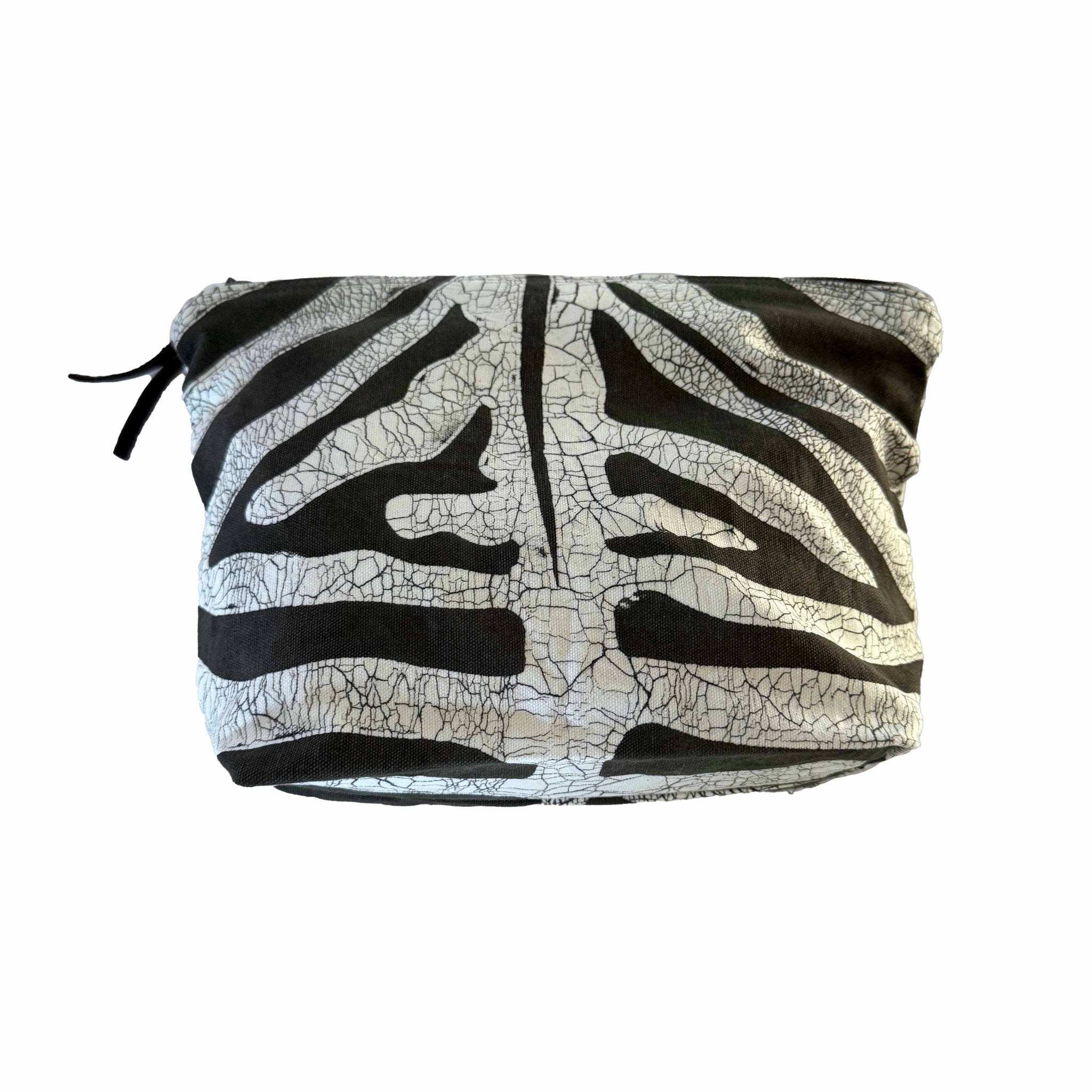 Hand made travel wash bag in zebra print, zip up with internal pocket.