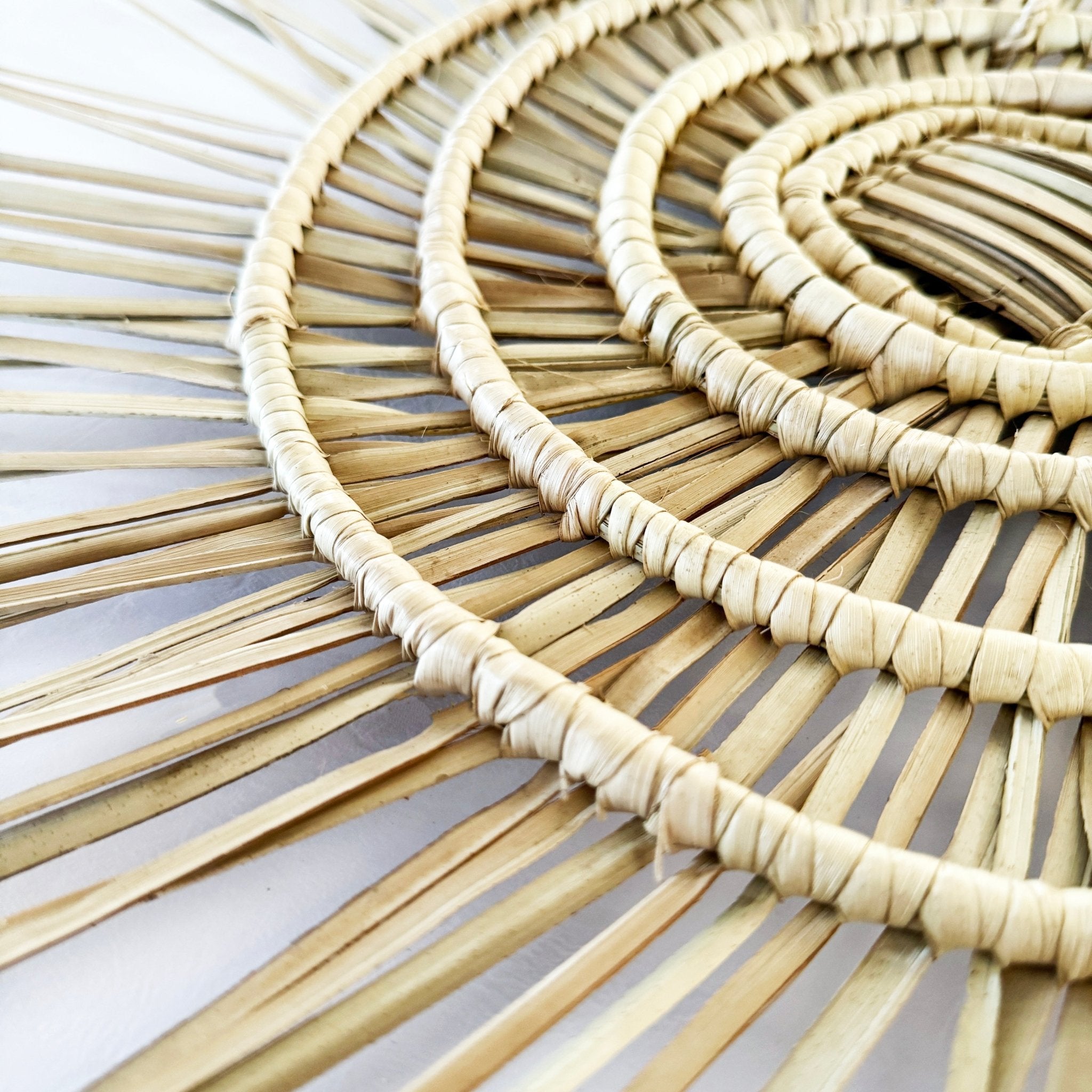 naturally handwoven palm African wall hanging spiral artwork.
