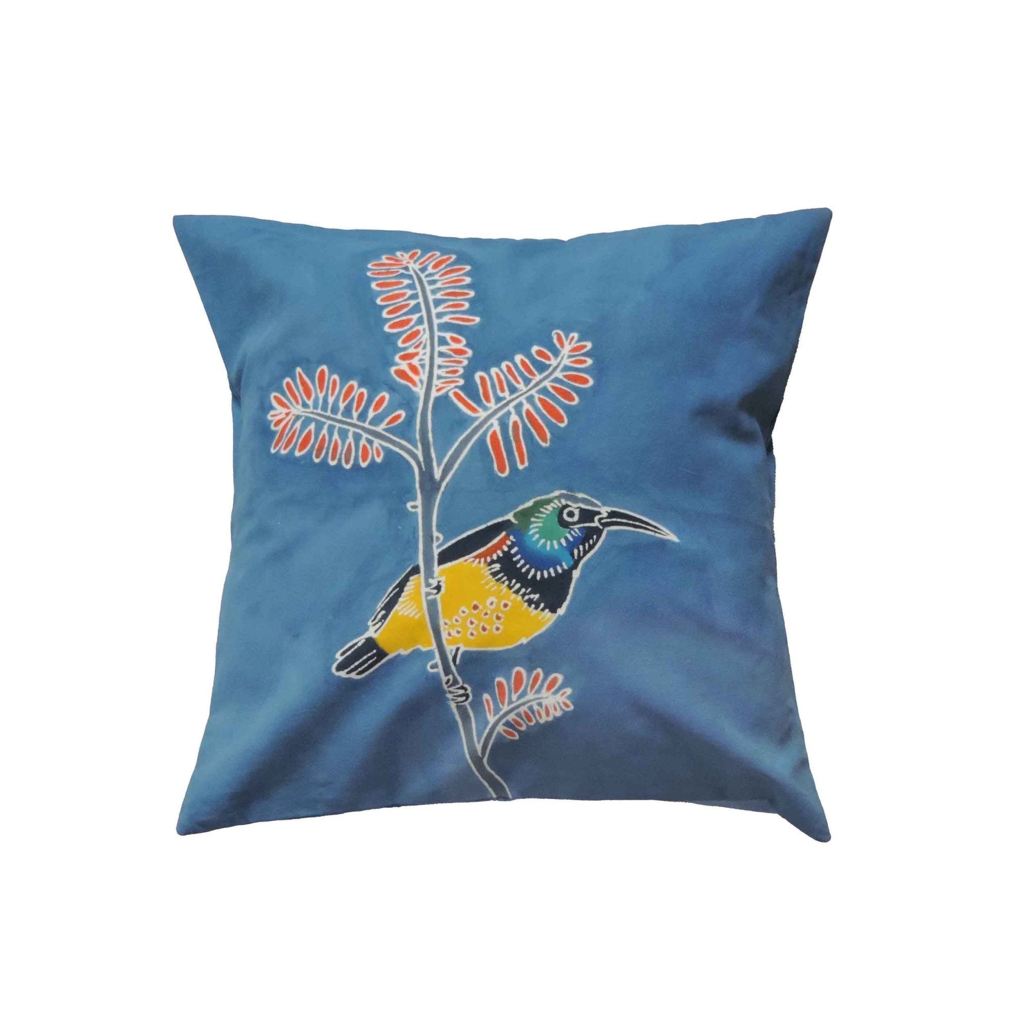 The perfect deep blue cushion cover with a bright beautiful yellow sunbird, adorned with intricate patterns and pure cotton.