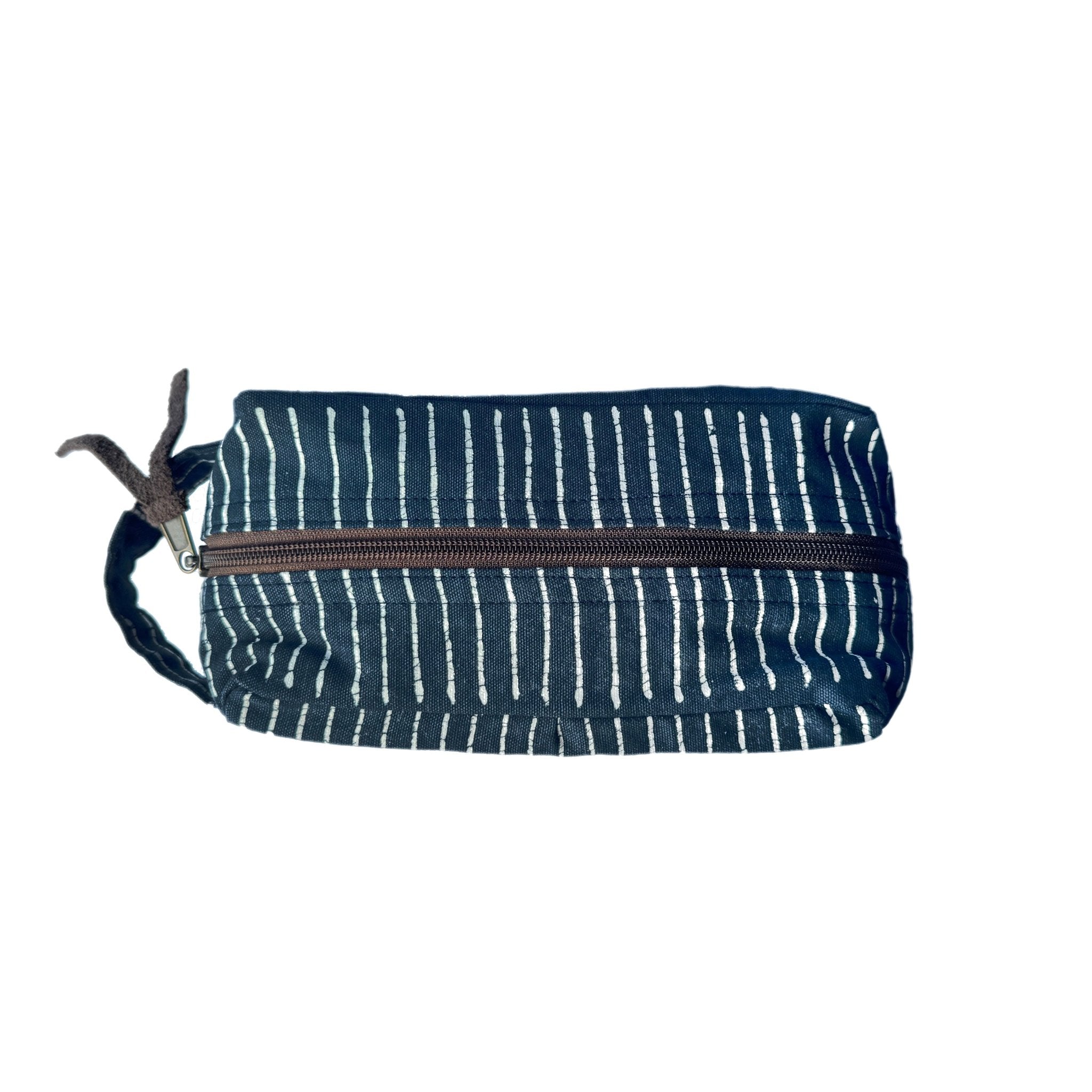 Travel in sustainable style with our indigo travel pouch adorned with an bohemian linear pattern.