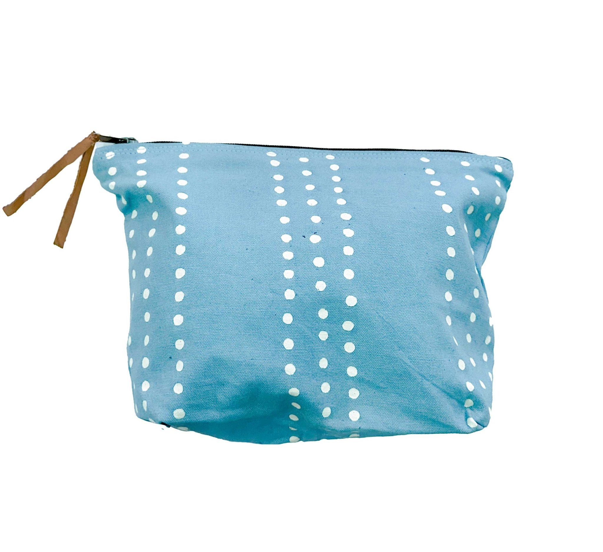 wash bag with dots in light blue, handcrafted in Africa and made in 100% organic cotton