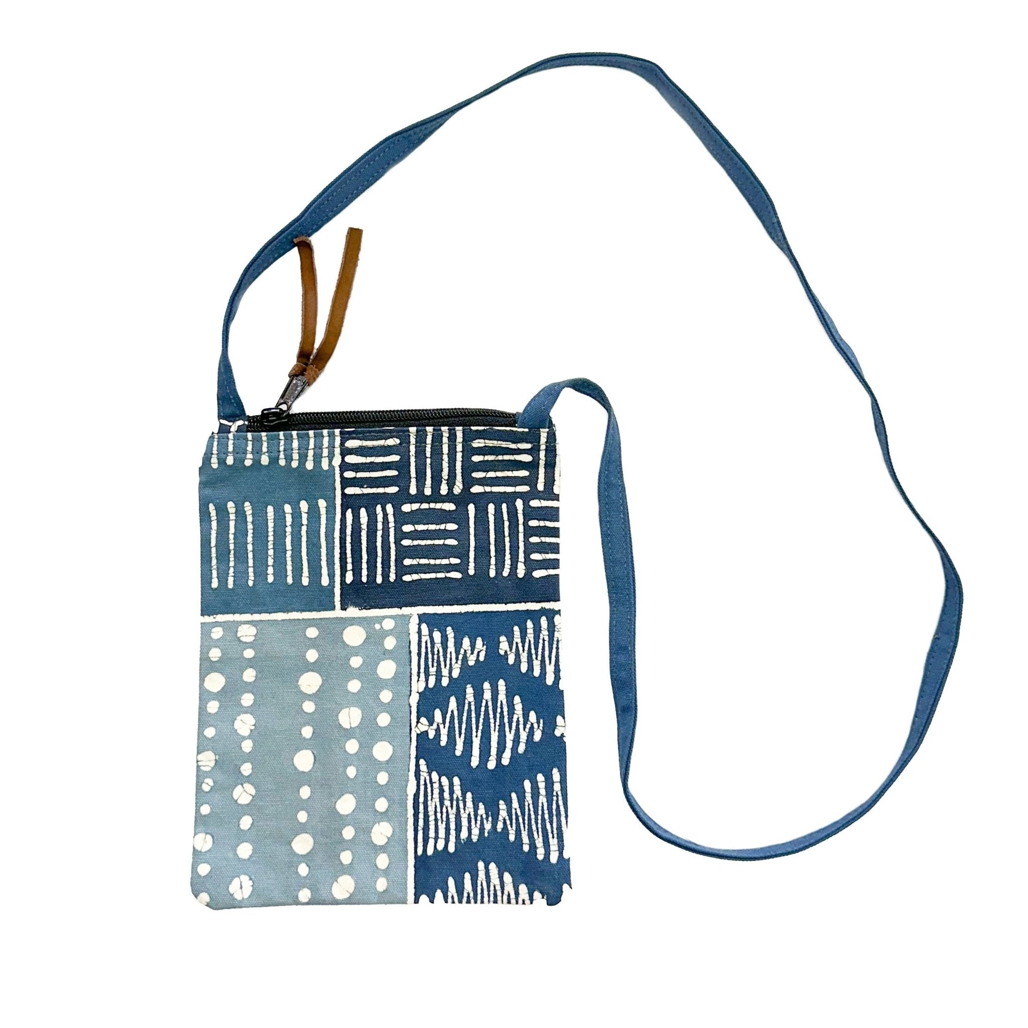 Small passport travel bag hand made from organic cotton in blues.