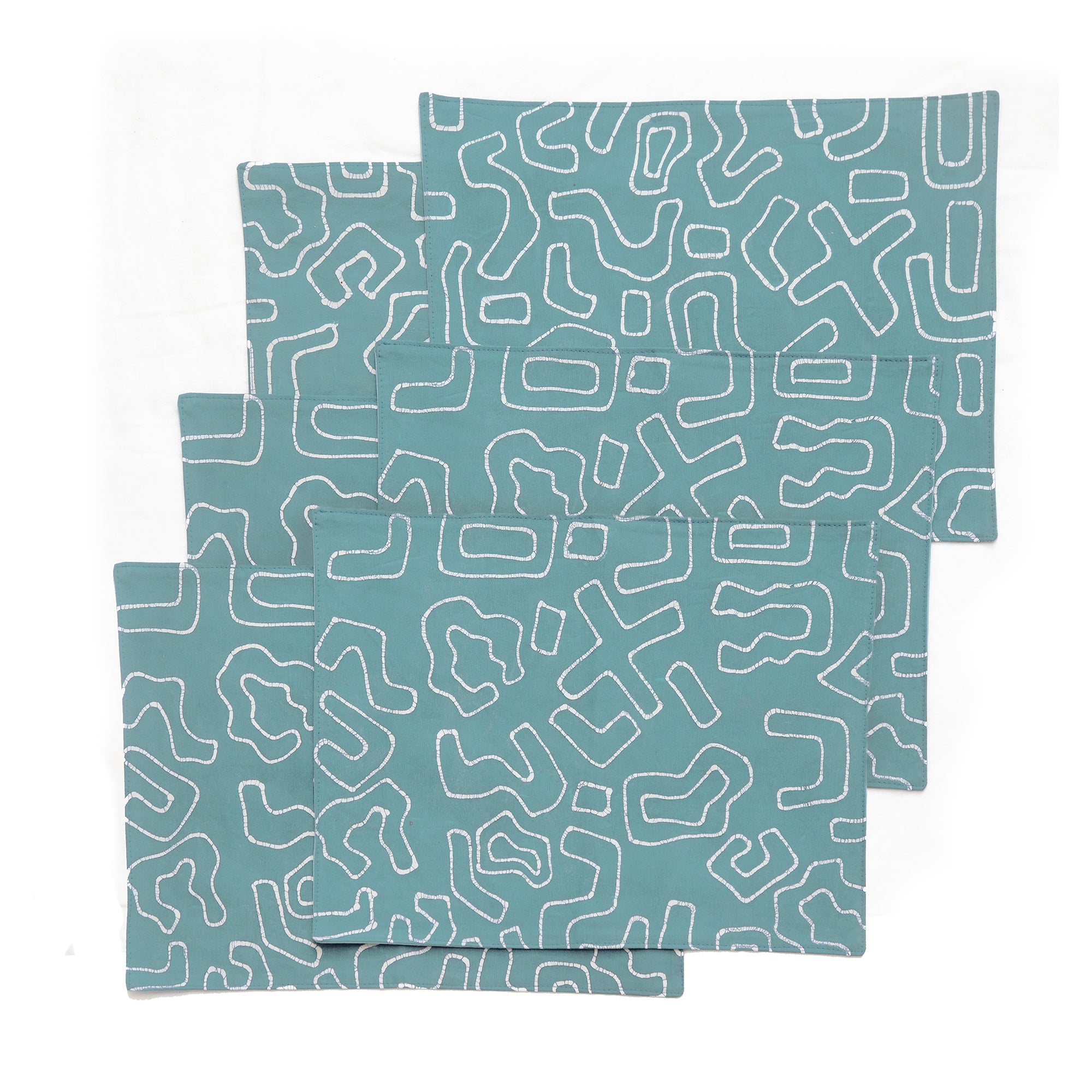 Light Blue placemats with a bold playful batik pattern