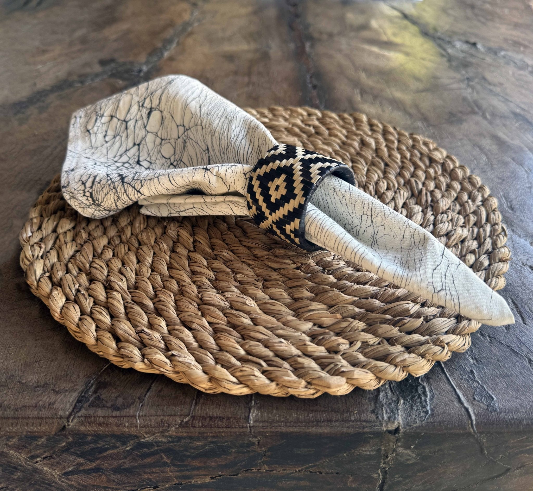 Handcrafted in palm, diamond pattern napkin ring design.
