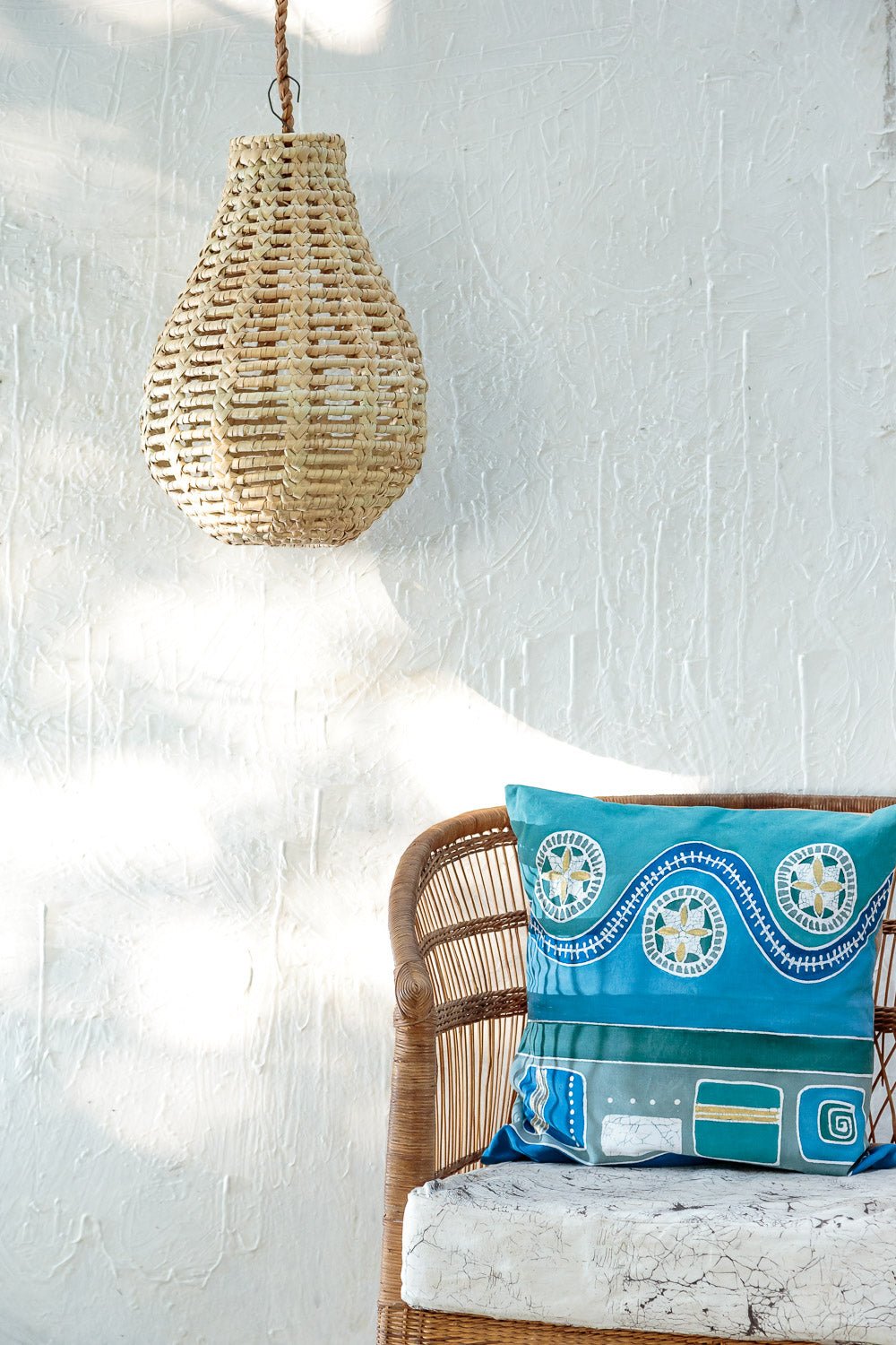 Blue cushion cover inspired by hill and wave landscapes, made from 100% cotton.