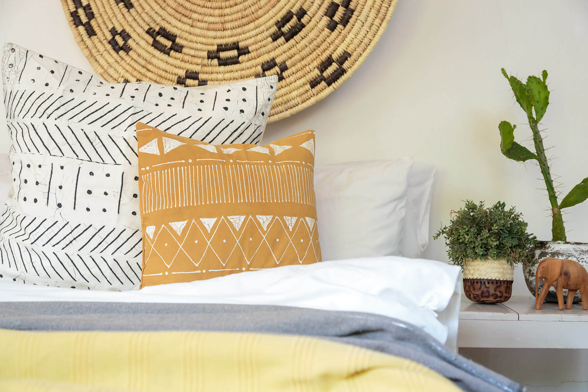Mustard linear Matika cushion cover, handmade with organic cotton for a natural touch.