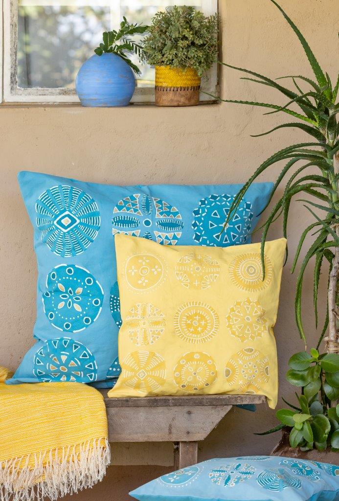 Hand-painted bright aqua cushion covers, are the perfect match of sustainability and style.