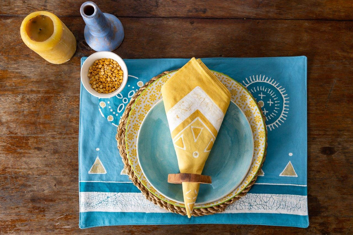 Swim in our light blue table mats, shop Tribal Textiles today.