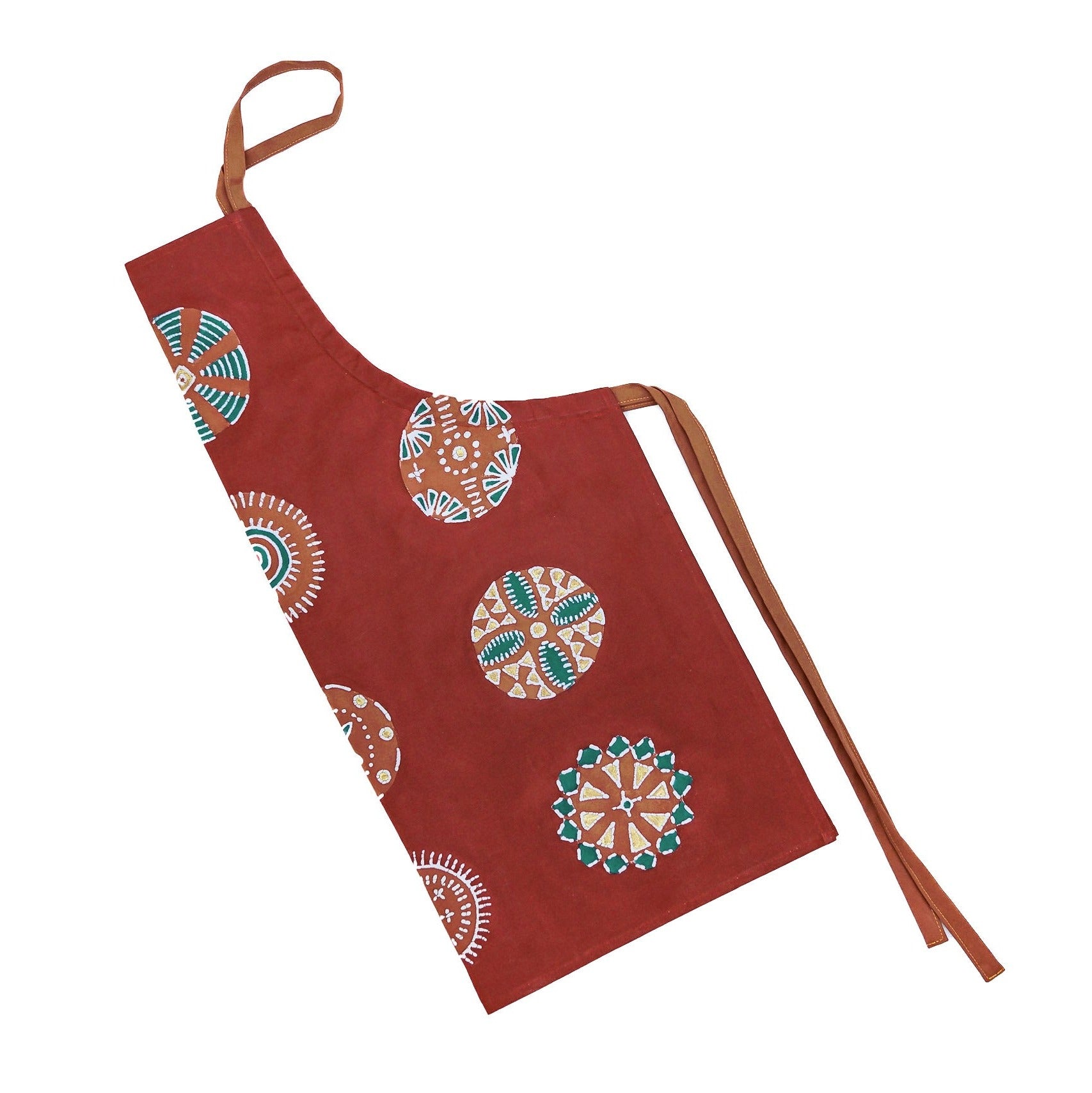 The perfect winter apron with circular patterns and red and gold accents.
