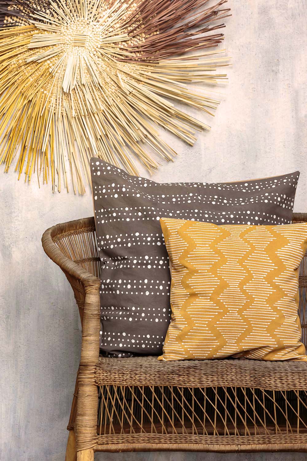 The perfect mustard yellow cushion cover, adorned with a bohemian chic wave patterned.
