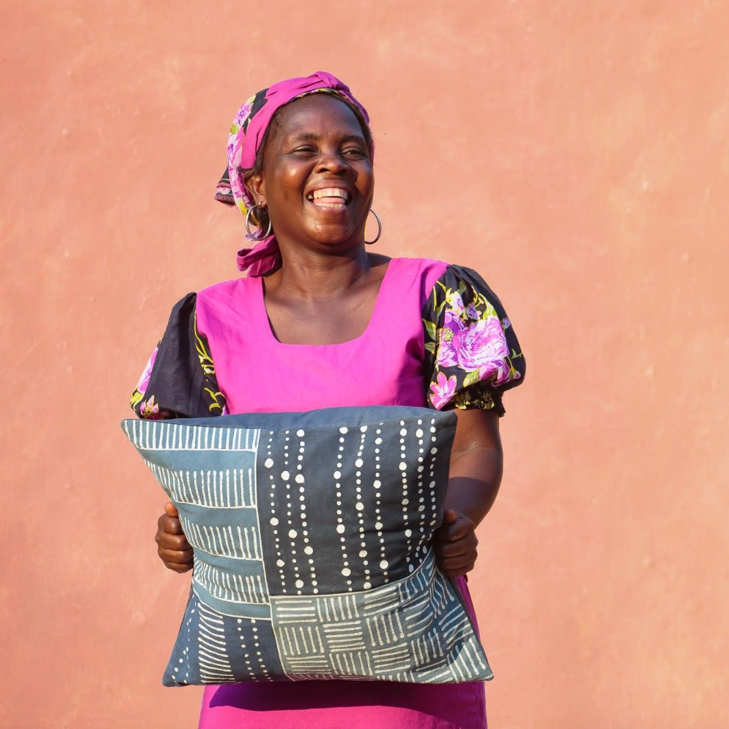 Artisan-crafted dark blue cushion cover with tribal cloth indigo patchwork.