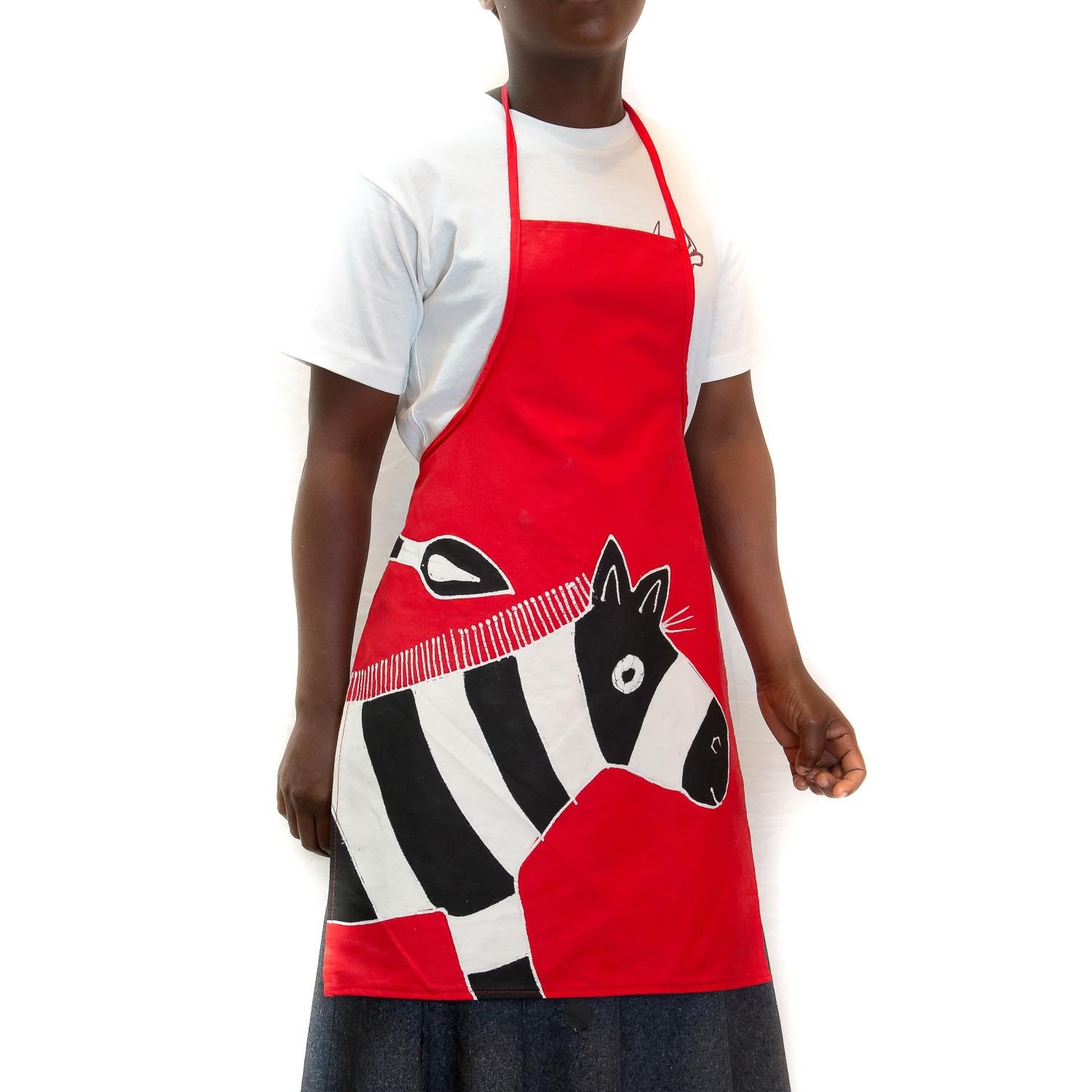 Bright red apron adorned with beautiful zebra on 100% cotton, for sustainable buyers.