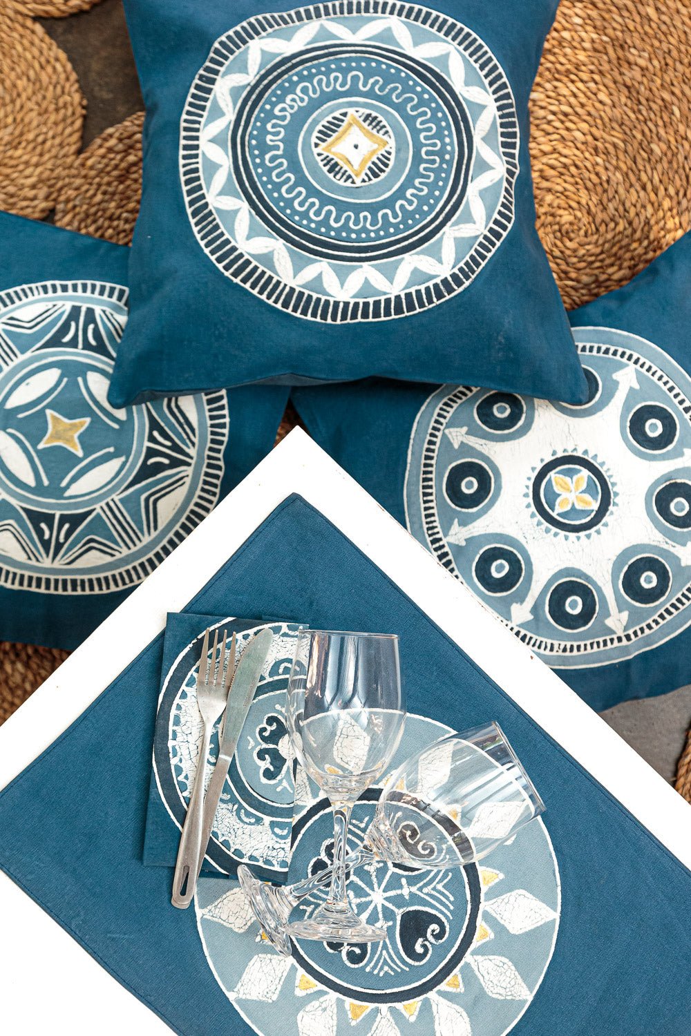 Indigo cushion with circular patterns.