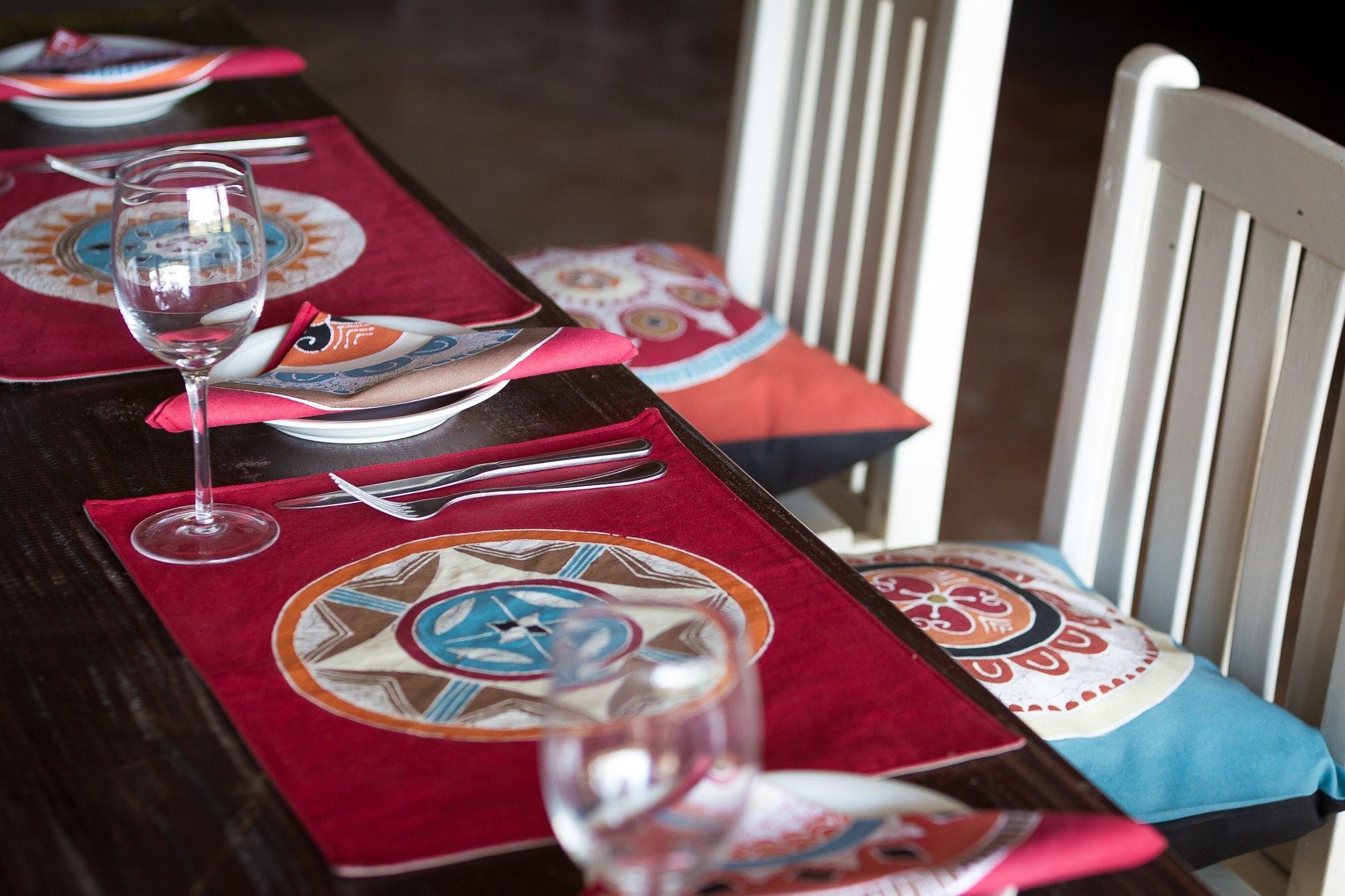 Bright red Massai table mats. Bring bohemian elegance to your table today!