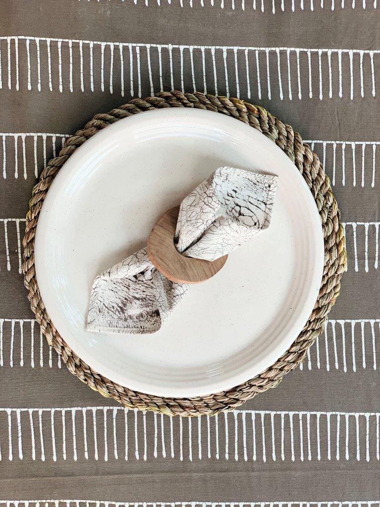African made table mats with stunning linear patterns and a naturally cloured dark taupe background.