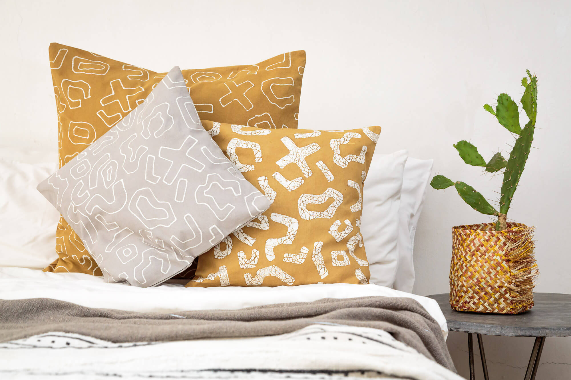 Mustard yellows and beautiful patterns to create vibrant comfort in bohemian chic households.