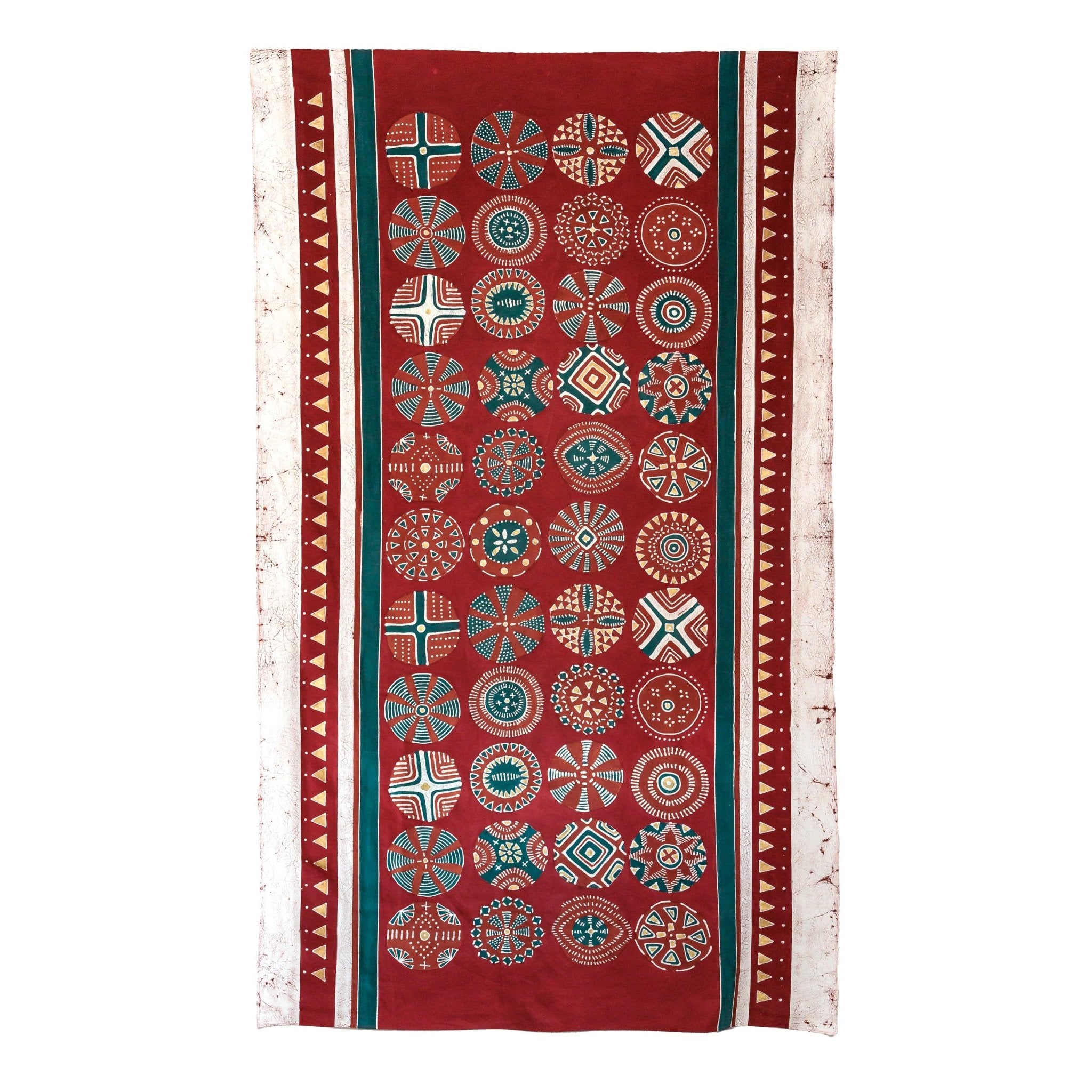 Bright beautiful red table cloth adorned with gold accents and intricate circular patterns.