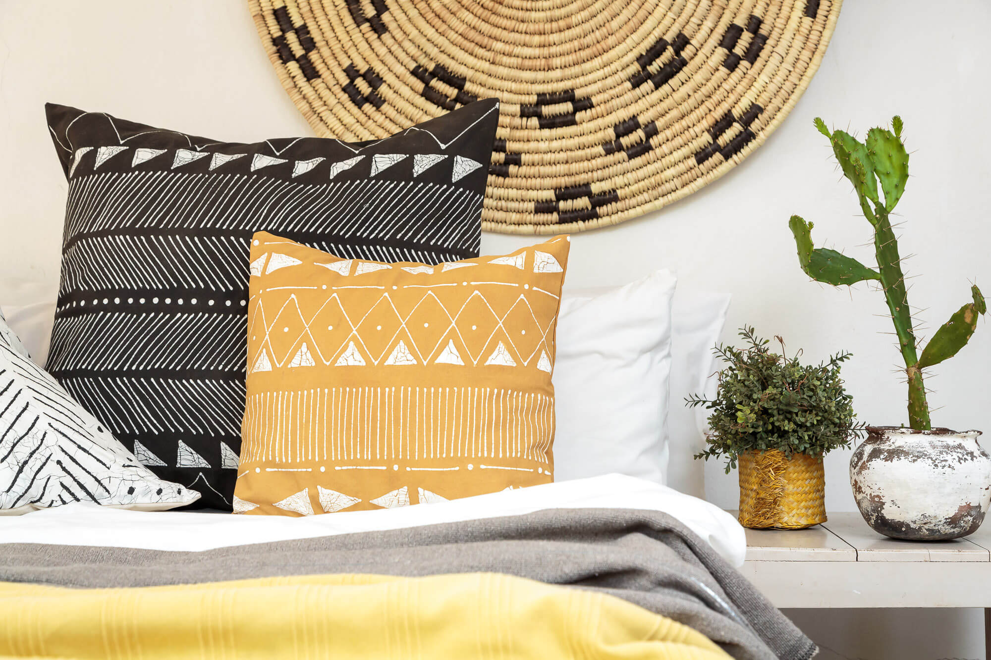 Eco-friendly cushion cover in Matika Mustard linear design, perfect for sustainable living.