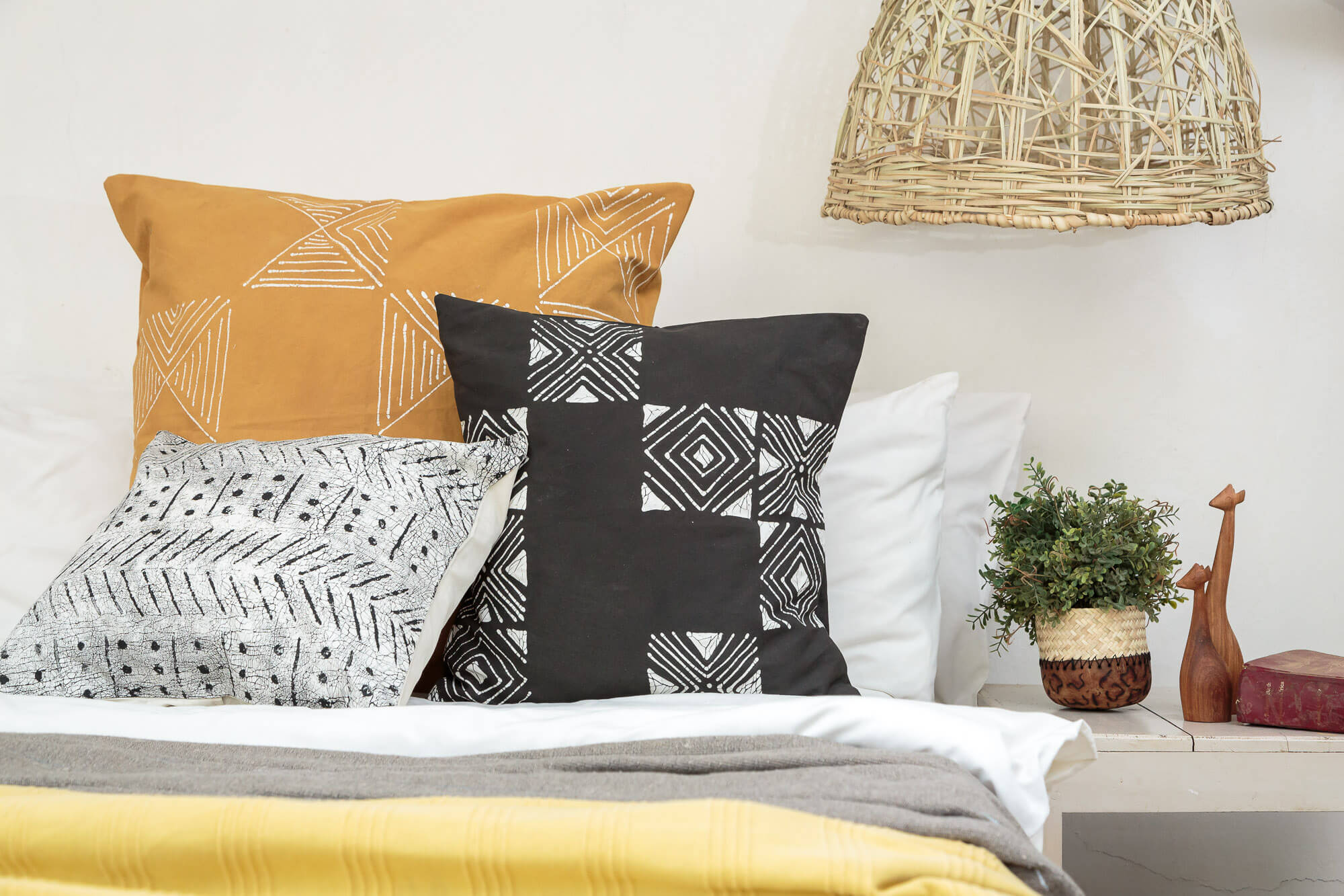 Eco-friendly cushion cover in Matika Mustard grid, perfect for sustainable interiors.