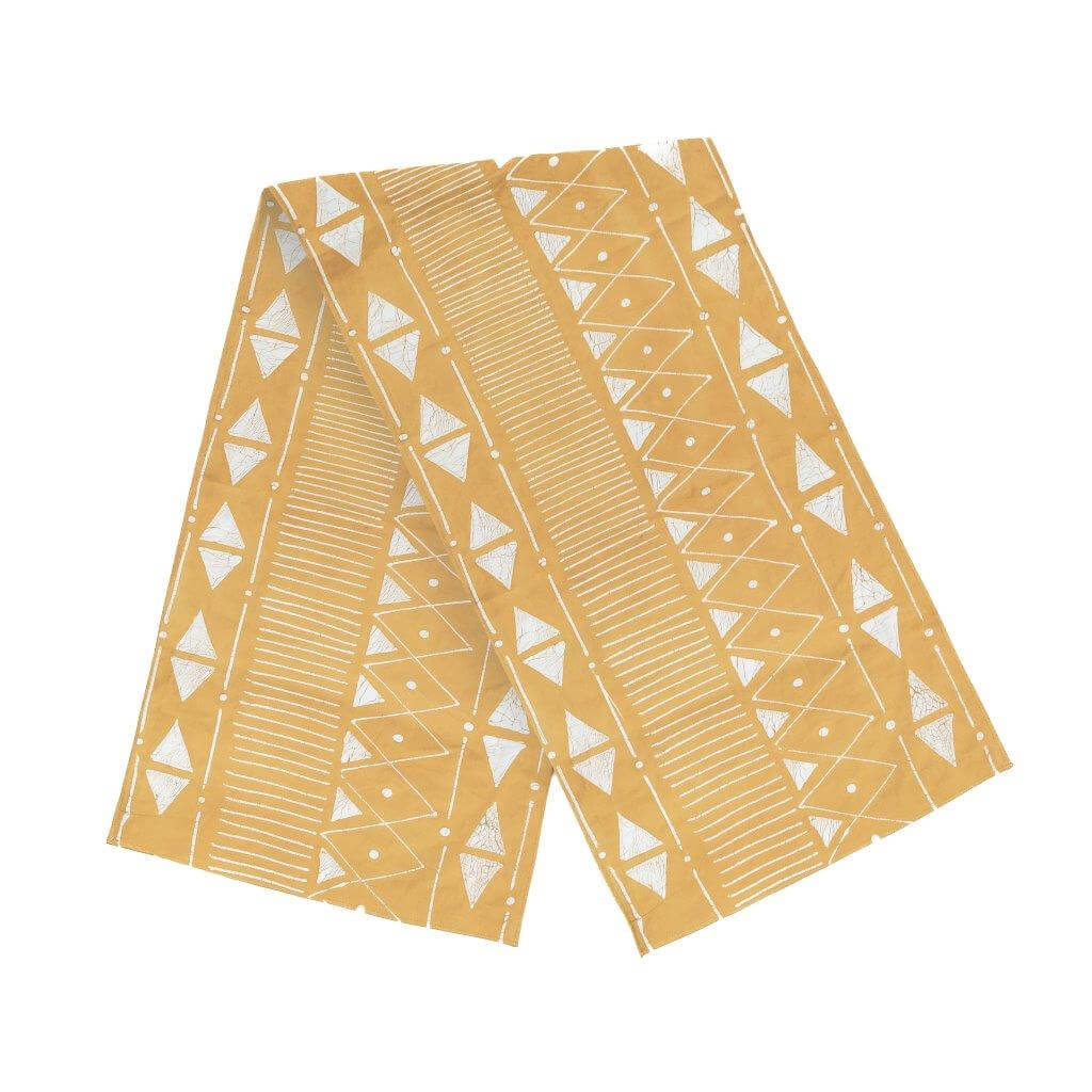 Handcrafted Matika Mustard linear table runner, perfect for adding contemporary elegance to your dining table.