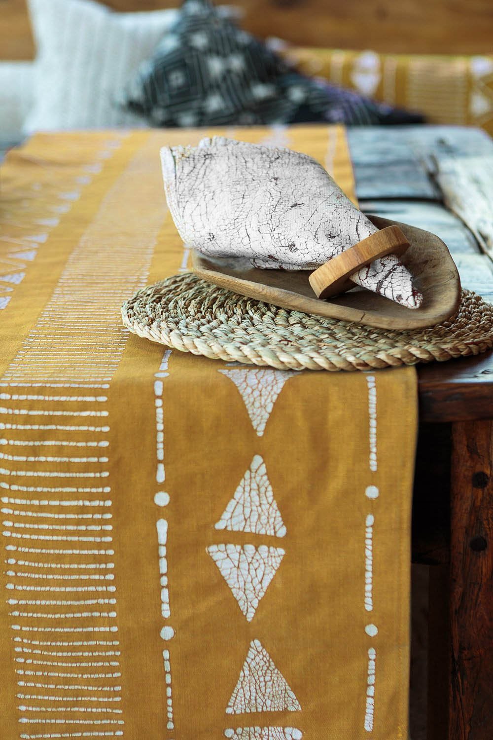 Mustard linear Matika table runner, handmade with organic cotton for a natural, eco-conscious look.