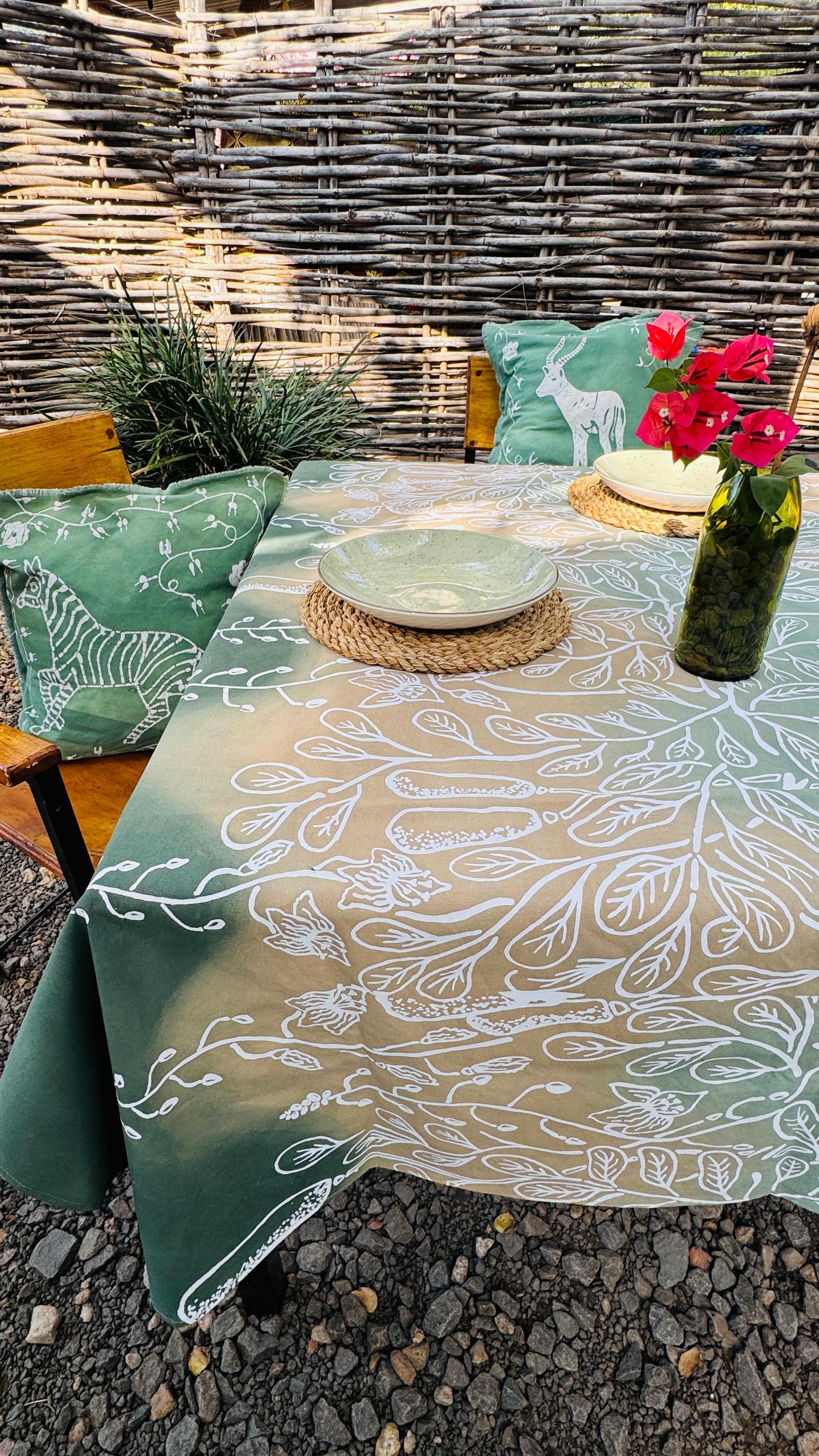 Ethical cotton tablecloth in gradient green, handmade in Zambia with artisan techniques for sustainable home decor and eco-conscious gifting.

