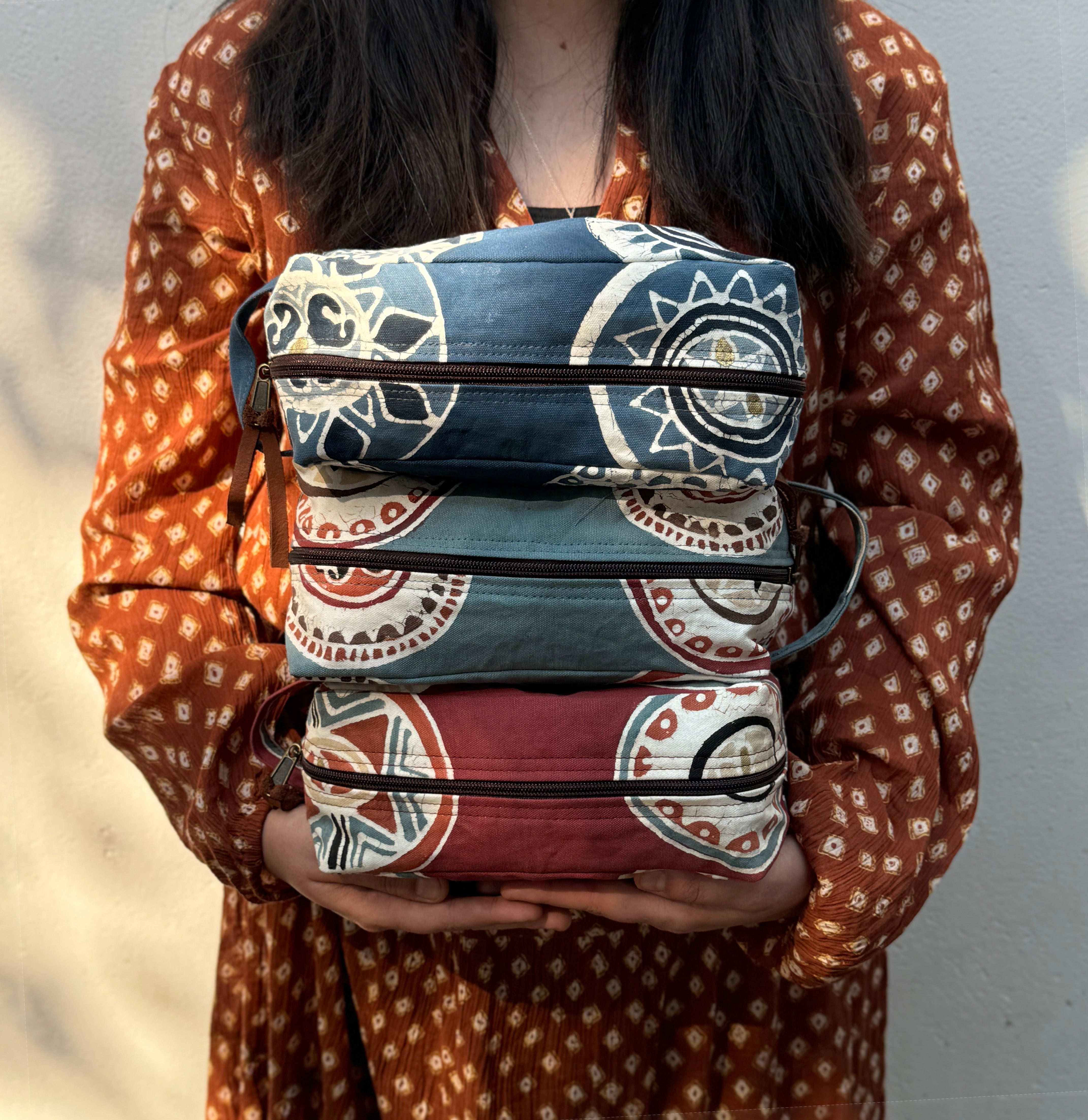 stack of handmade travel wash bags